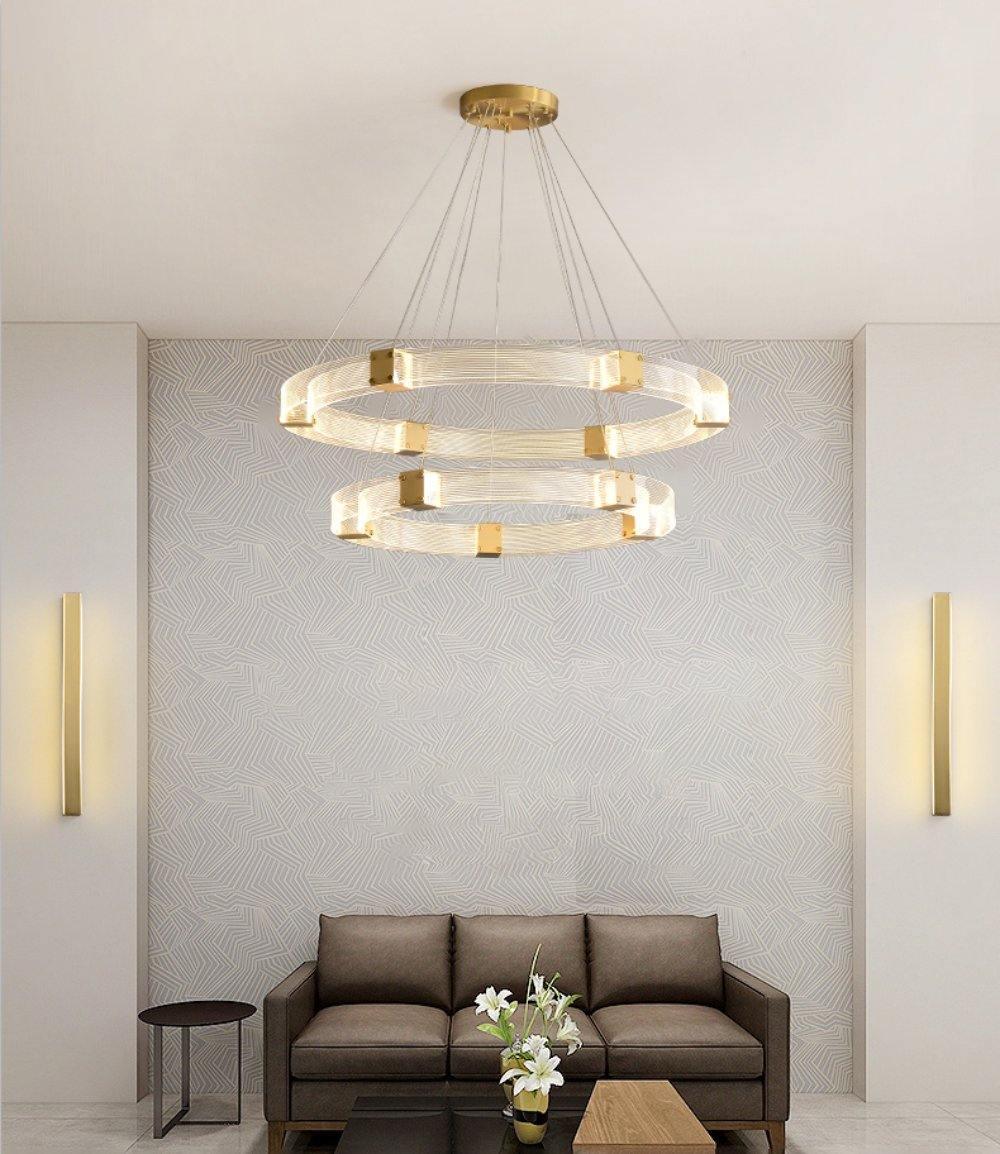 Parallel LED chandelier with textured acrylic bands and gold-tone connectors