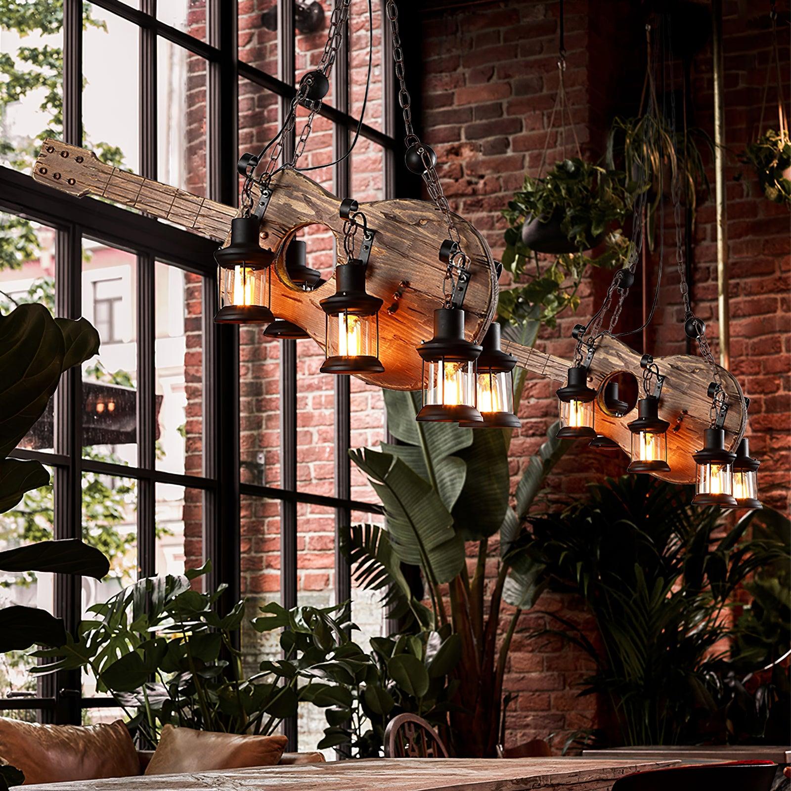 Two guitar pendants in an indoor arrangement