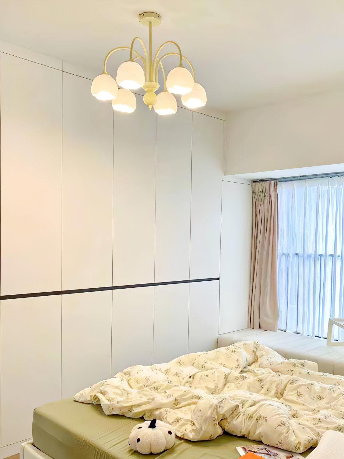 Creamy chandelier with white glass shades