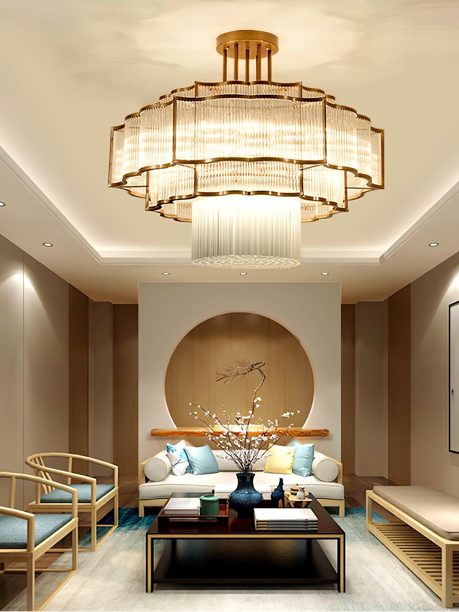 Pharo II tiered chandelier with clear ridged elements and a scalloped metal frame