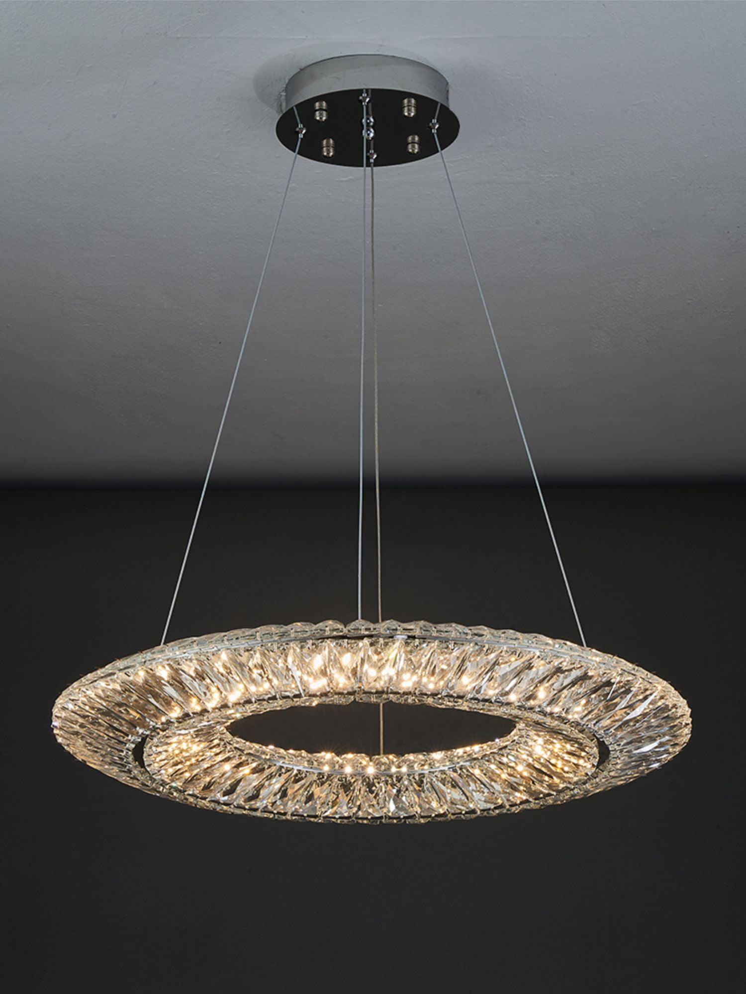 Two crystal rings against a dark background