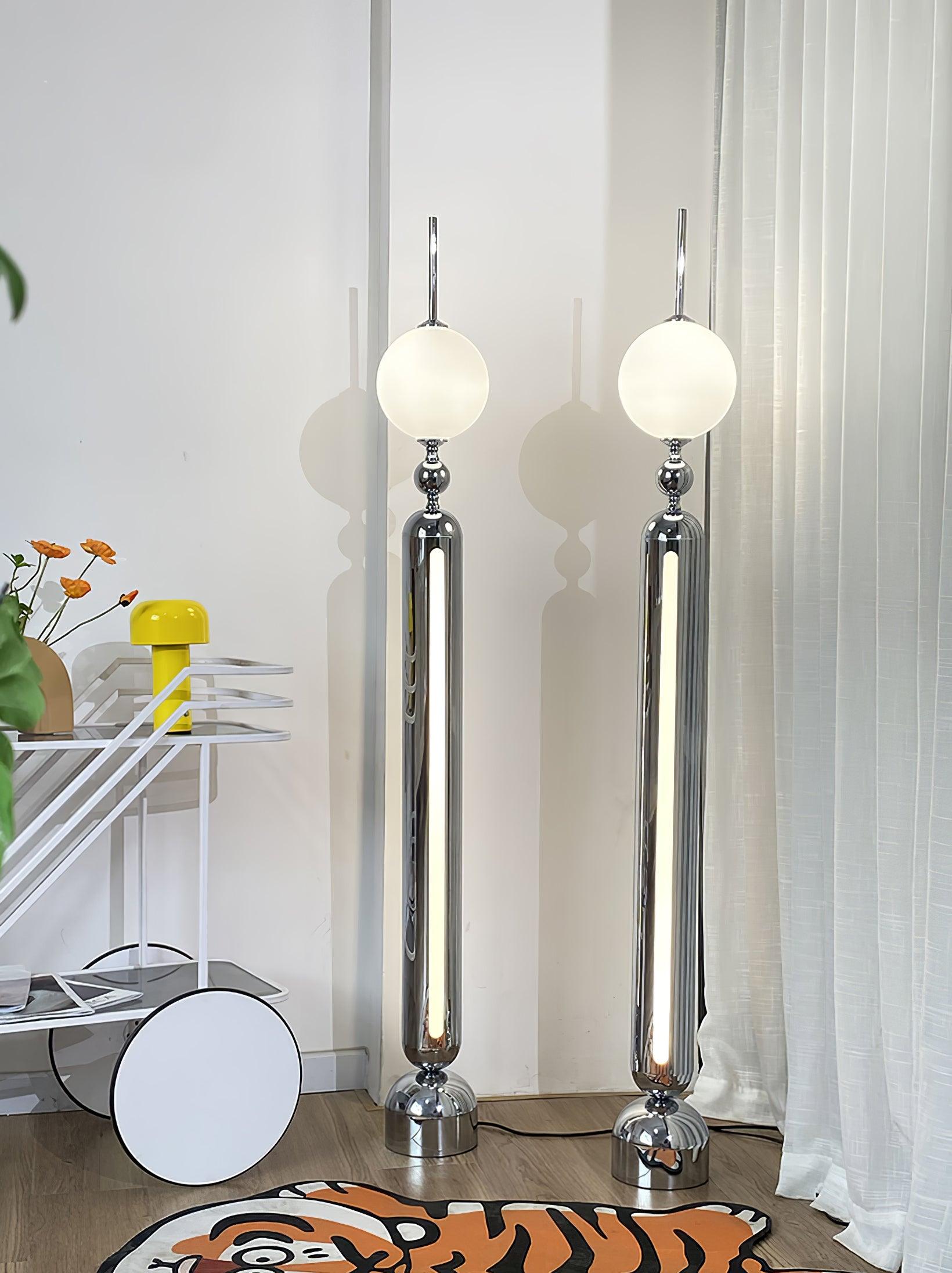 Lightning Rod chrome floor lamp with a white globe and vertical light strip