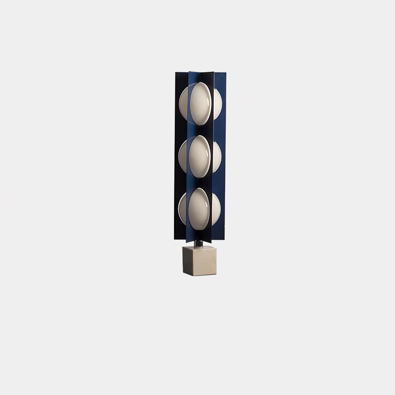 Wide isolated three-level blue column with white shades and a marble block base