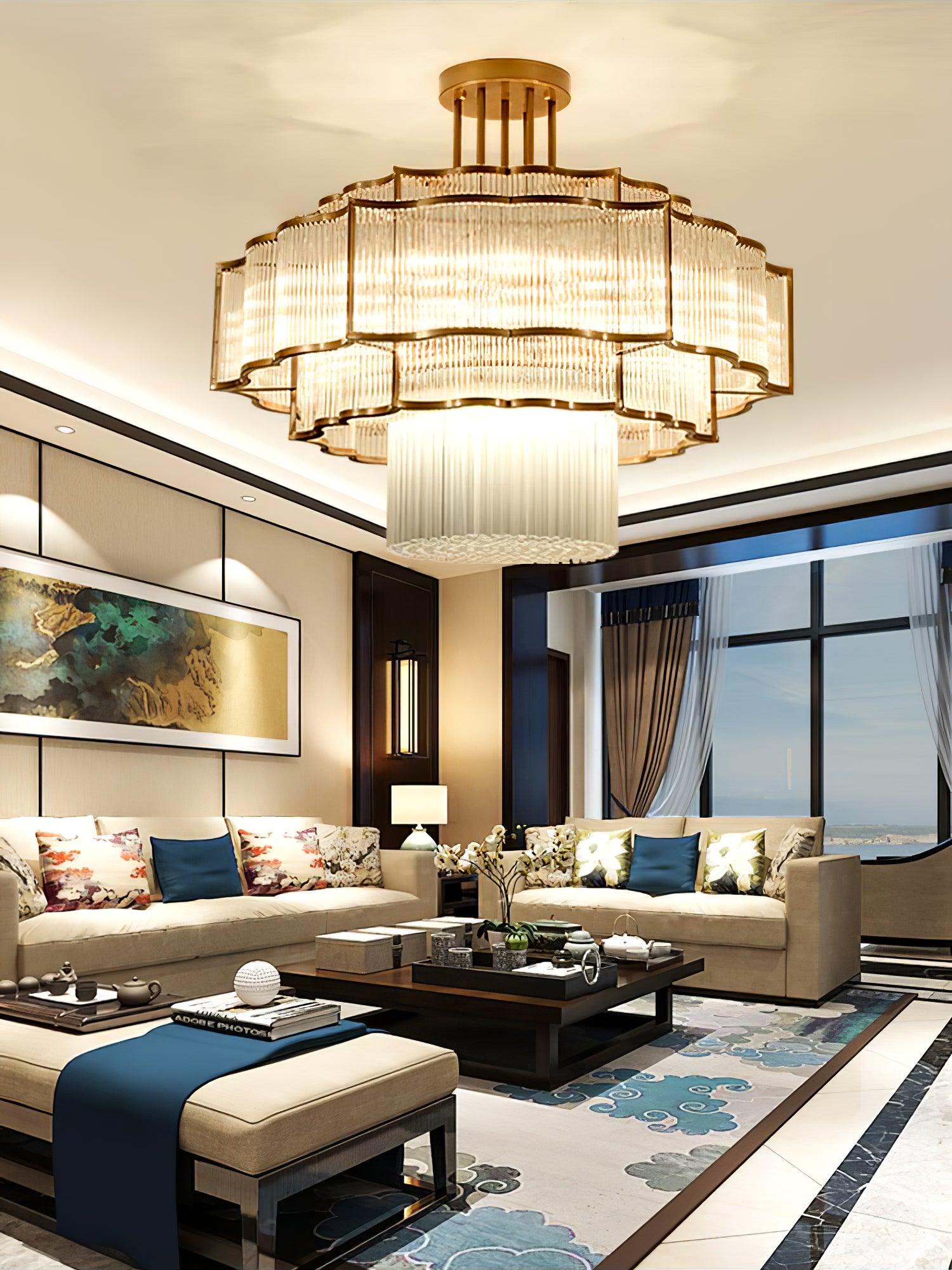 Pharo II tiered chandelier with clear ridged elements and a scalloped metal frame