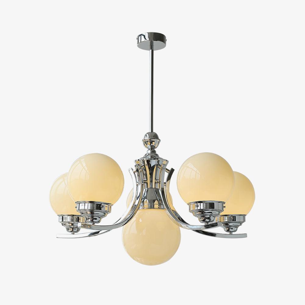 Isolated larger Dewdrop with cream-toned globes on rising chrome arms and a central downward globe on white