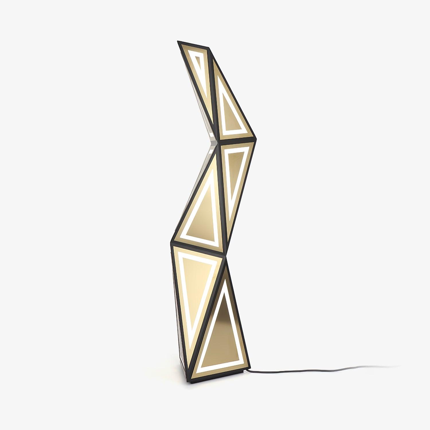 Farther full view of the geometric floor lamp with stacked angular sections and black lead