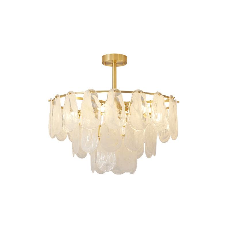 Round Cloud 60 cm pendant showing layered glass and its gold-tone frame from the front