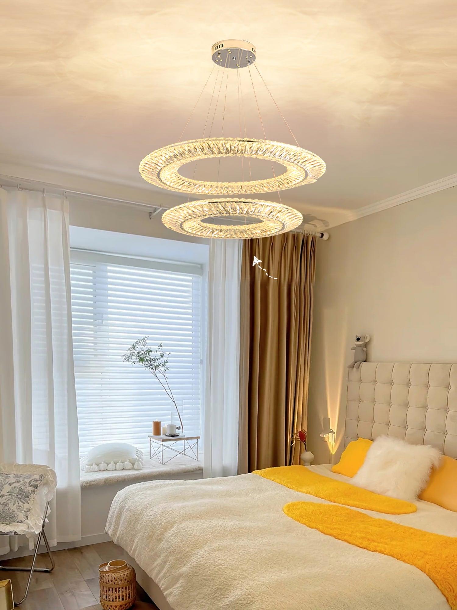 Two crystal rings in a bedroom scene