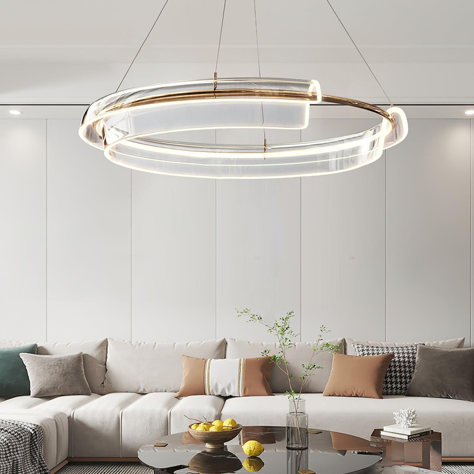 Circular chandelier above a living-room seating area