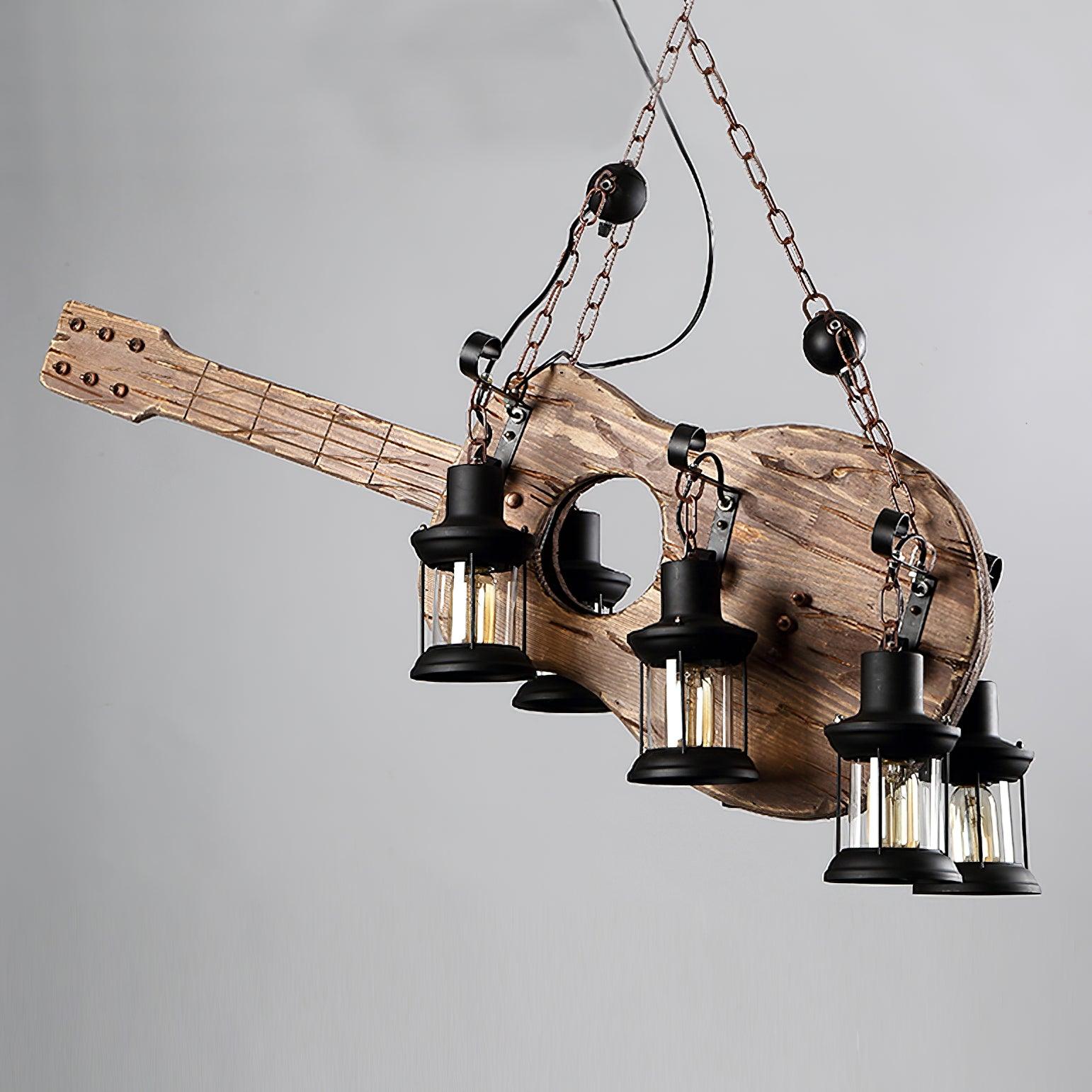 Unlit acoustic-style guitar pendant with glass lanterns
