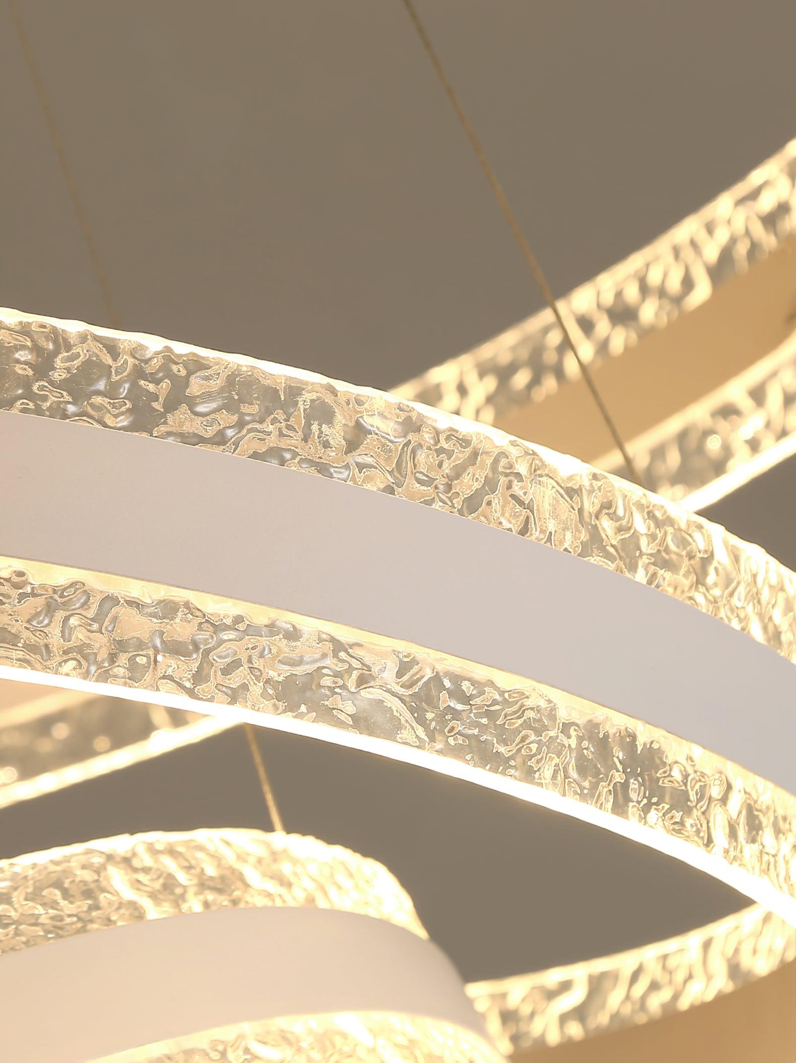 Warm-lit close-up of textured clear-looking edges above and below a pale ring centre band