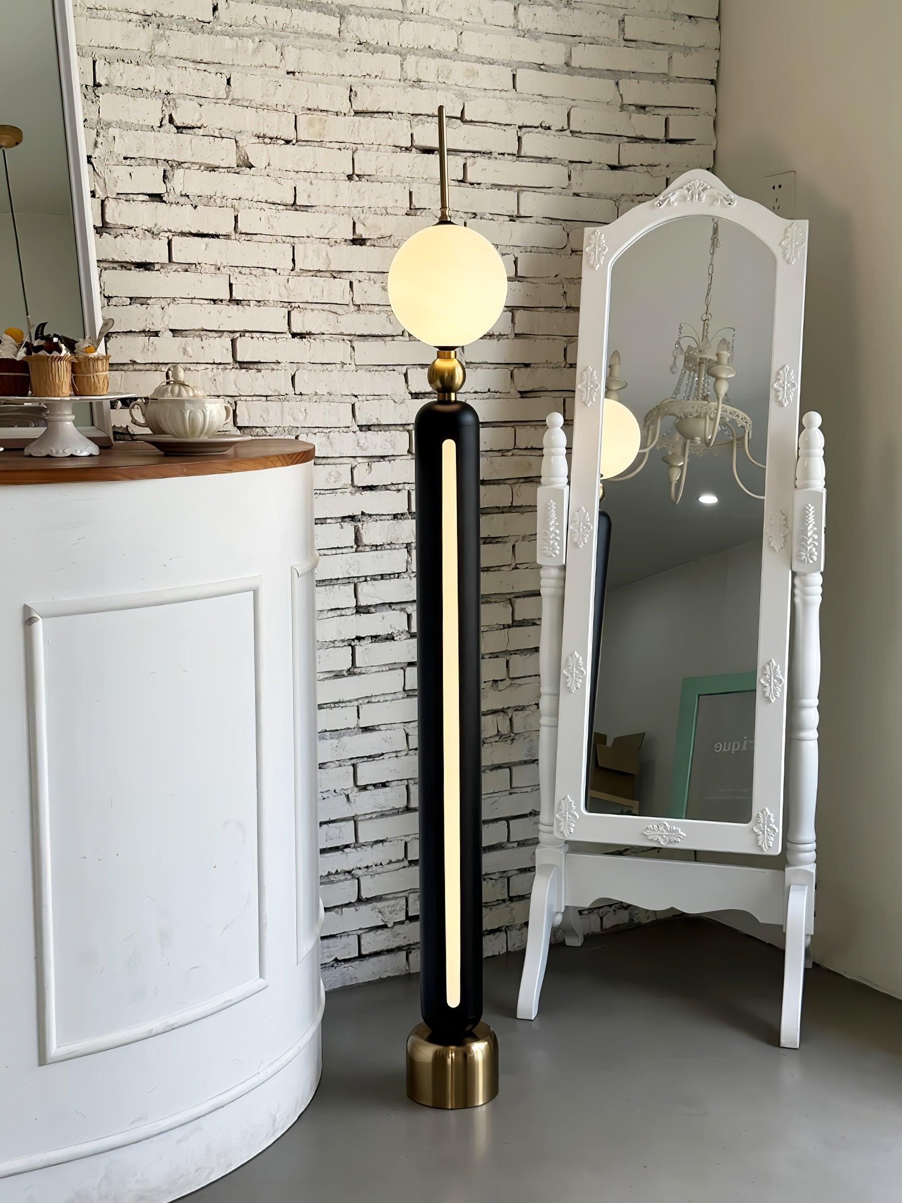Lightning Rod chrome floor lamp with a white globe and vertical light strip