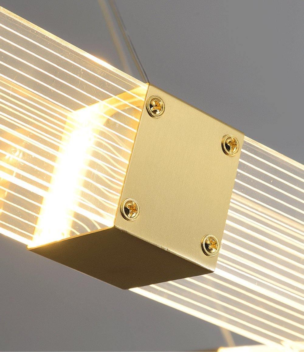 Parallel LED chandelier with textured acrylic bands and gold-tone connectors