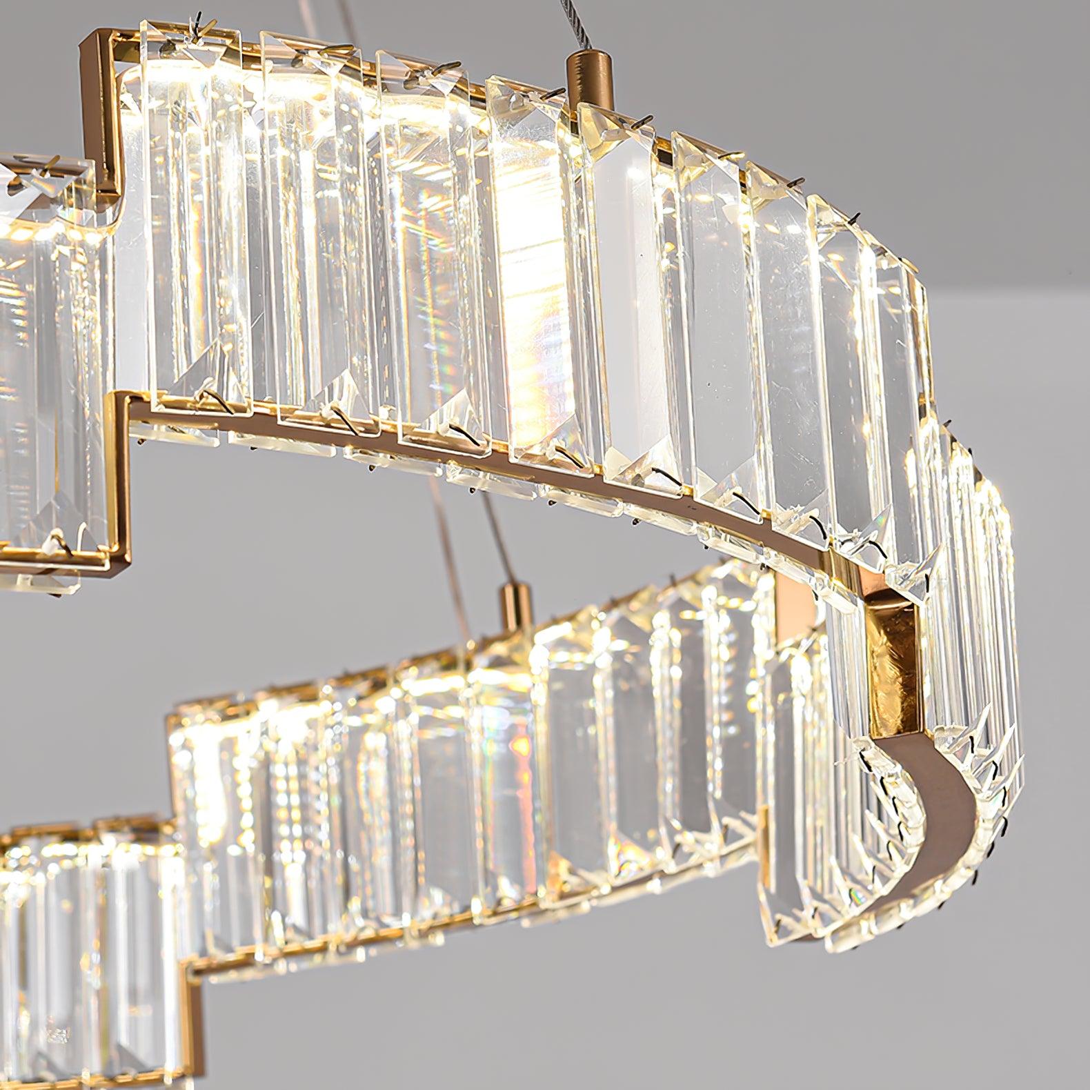 Close lit bevelled rectangular glass panels with small retaining clips and stepped gold-tone rails