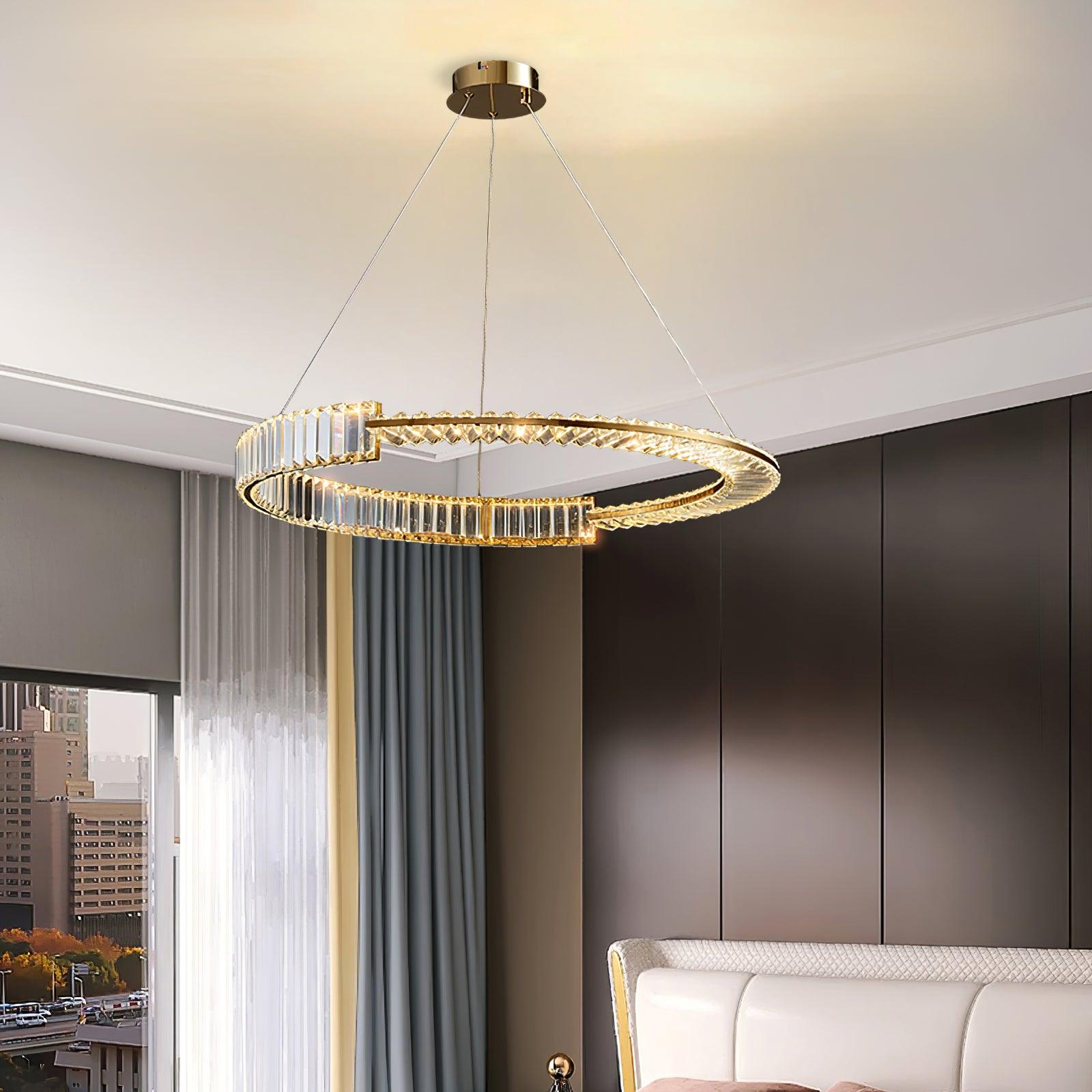 Stella Gold crystal ring chandelier near a window