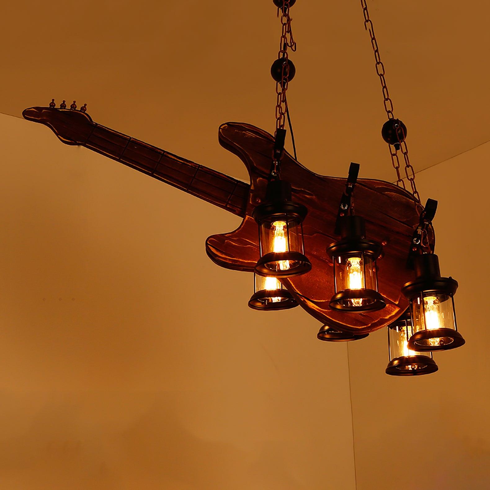 Electric-style guitar pendant illuminated in a room