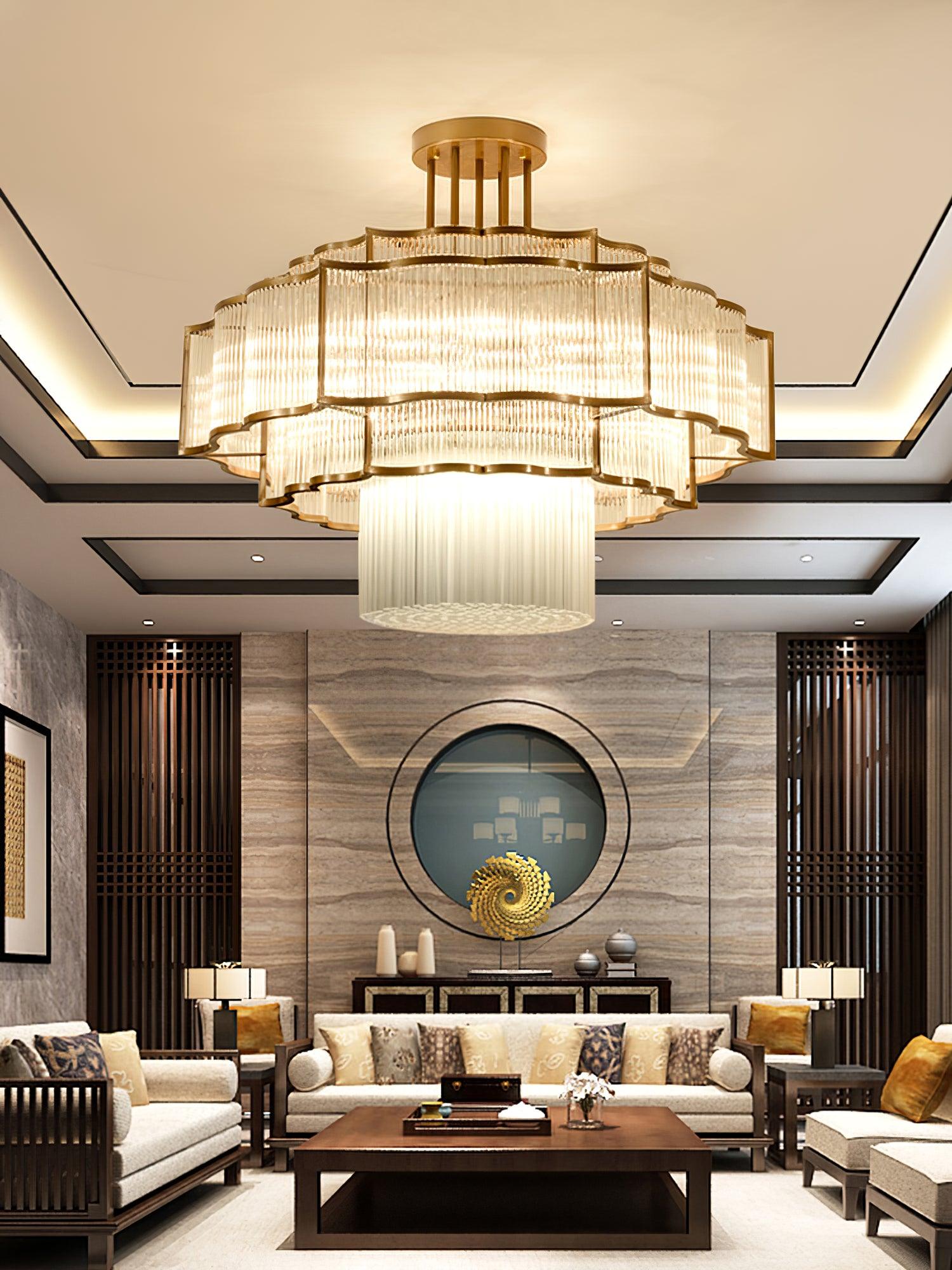 Pharo II tiered chandelier with clear ridged elements and a scalloped metal frame