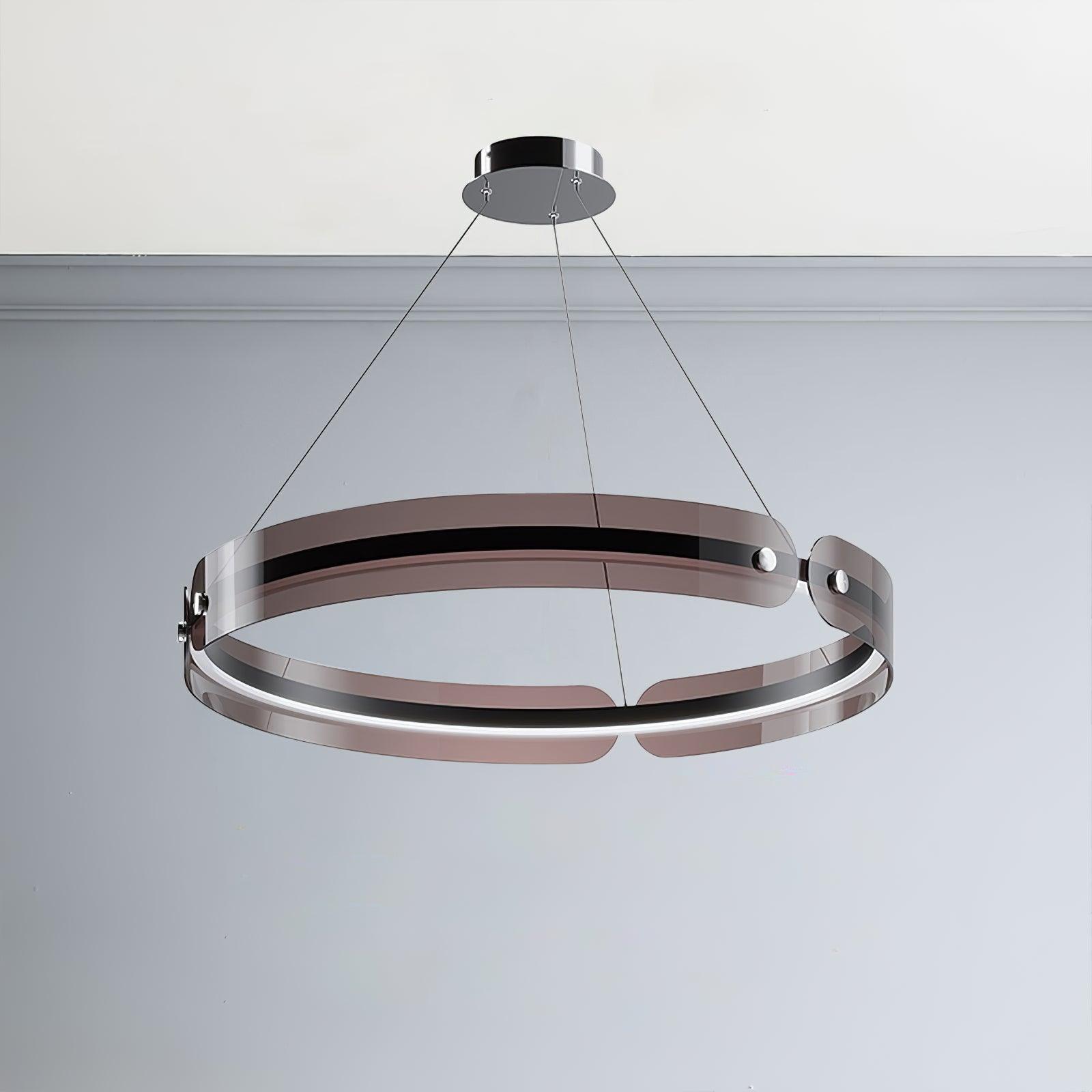 Illuminated Javor black and coffee acrylic ring with silver fasteners and a round canopy in a grey room