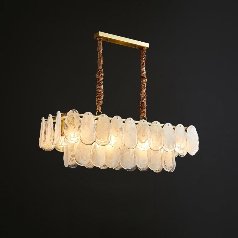 Linear Round Cloud pendant on a dark background with two fabric-wrapped hangers and an elongated ceiling canopy
