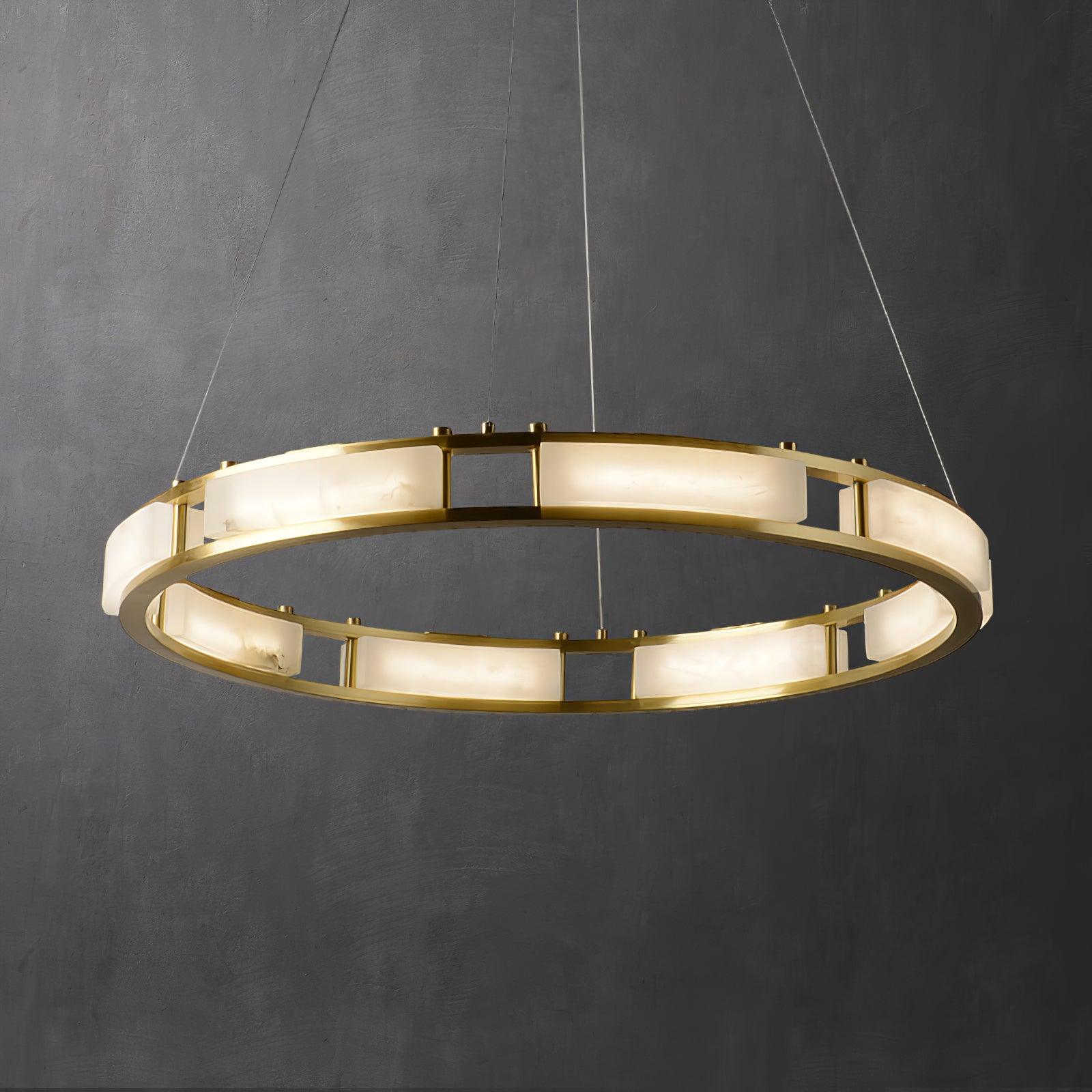 Illuminated Qatar brass and alabaster ring against a dark background