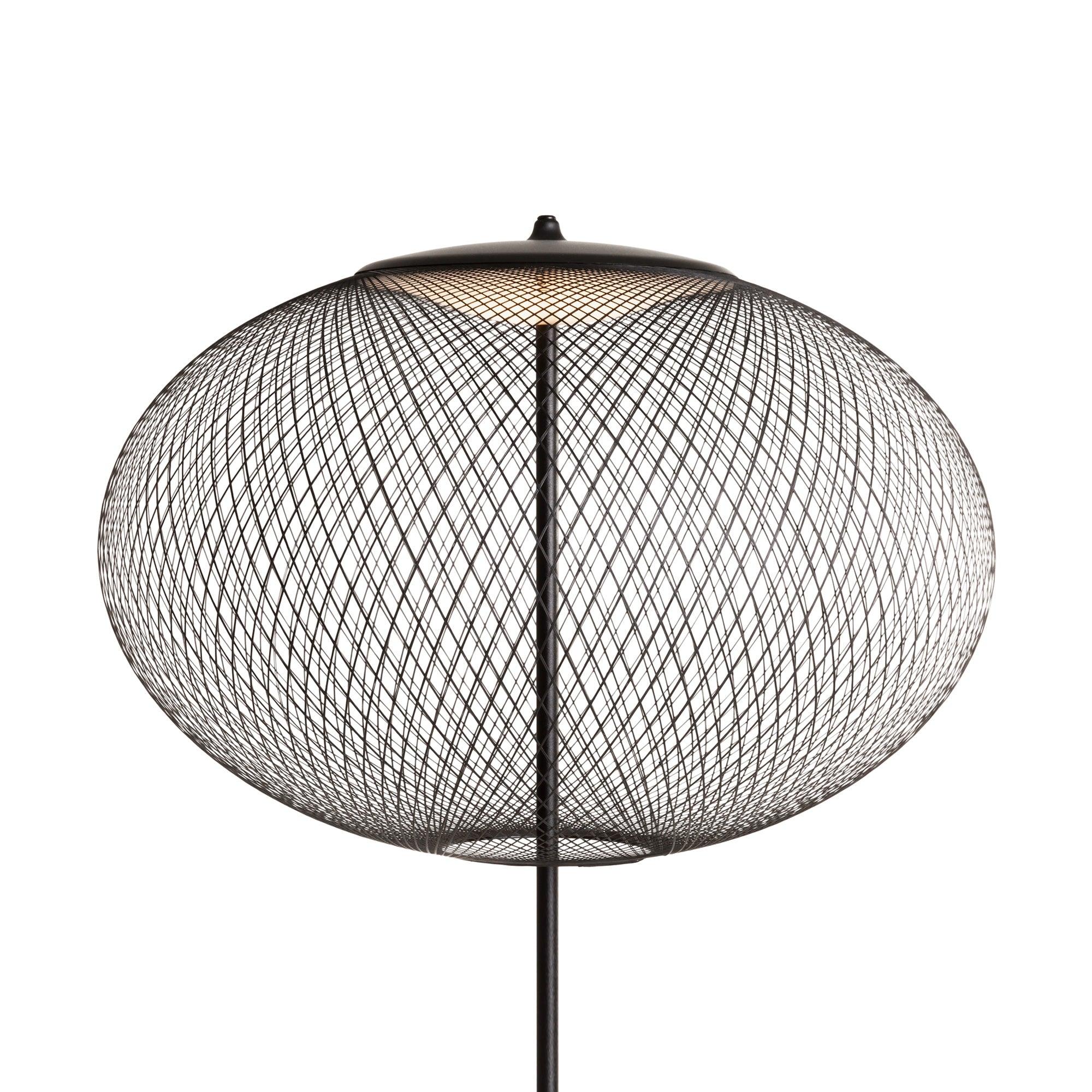 Front close-up of the black mesh globe, top cap, pale upper light element and circular lower opening