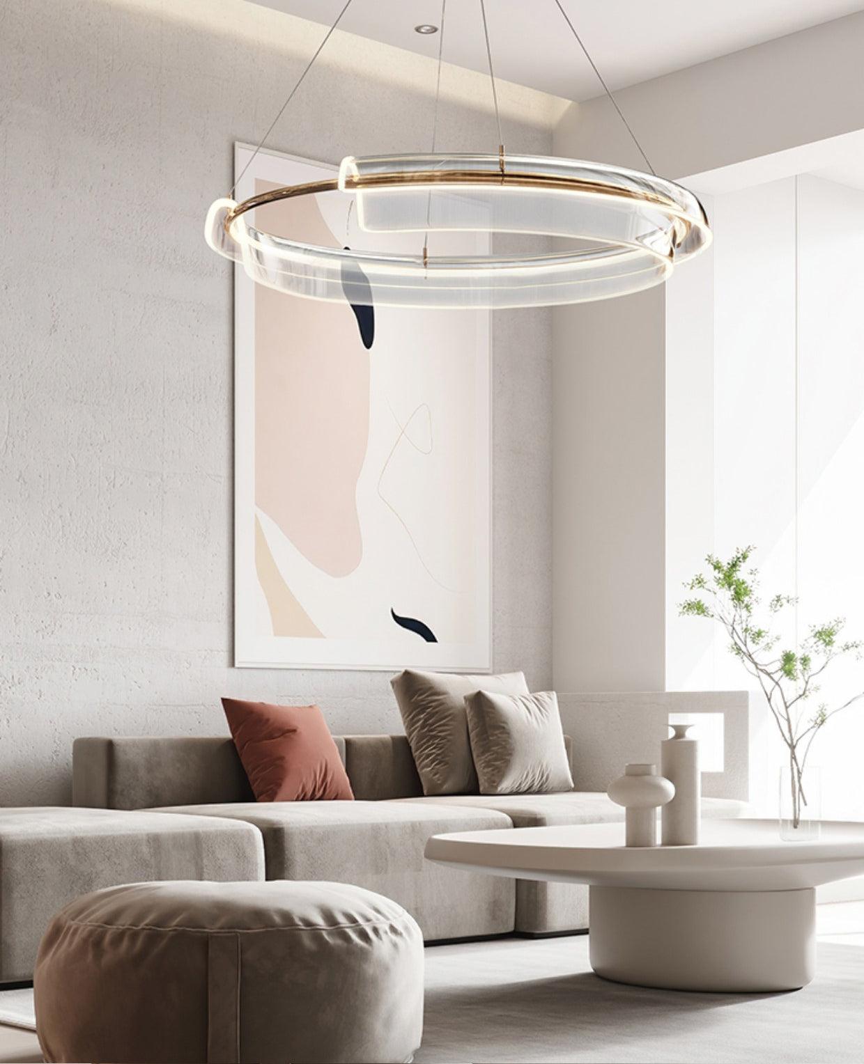 Ring chandelier above a sectional sofa