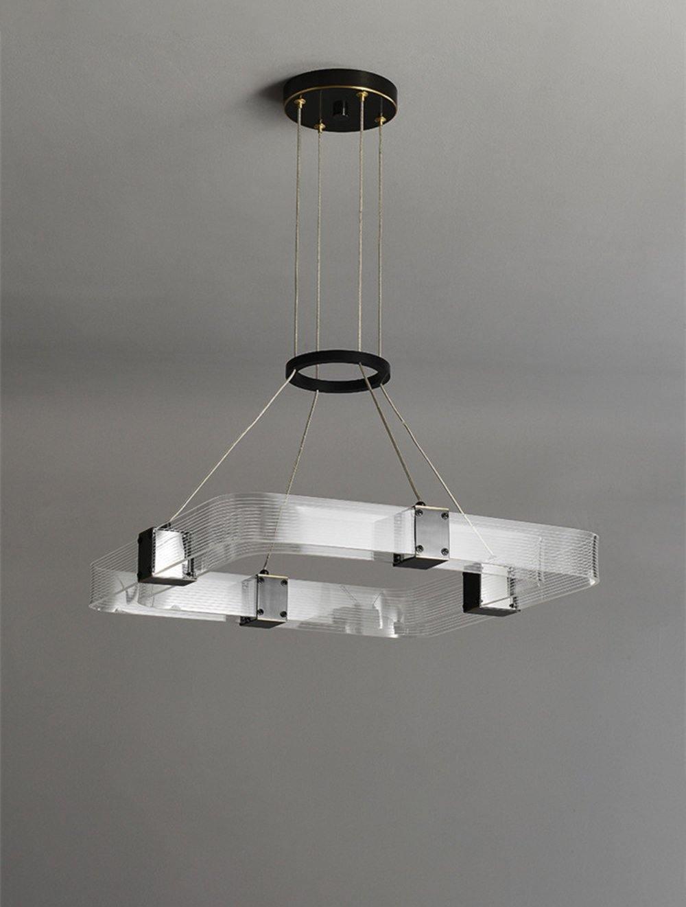 Parallel LED chandelier with textured acrylic bands and gold-tone connectors