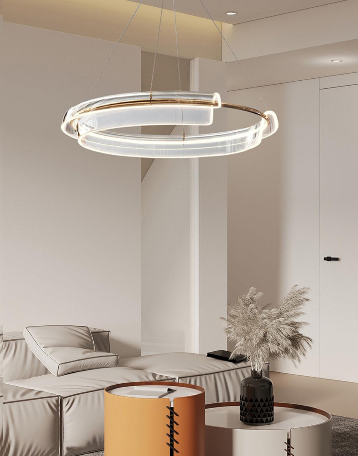 Circular chandelier in a living and dining area