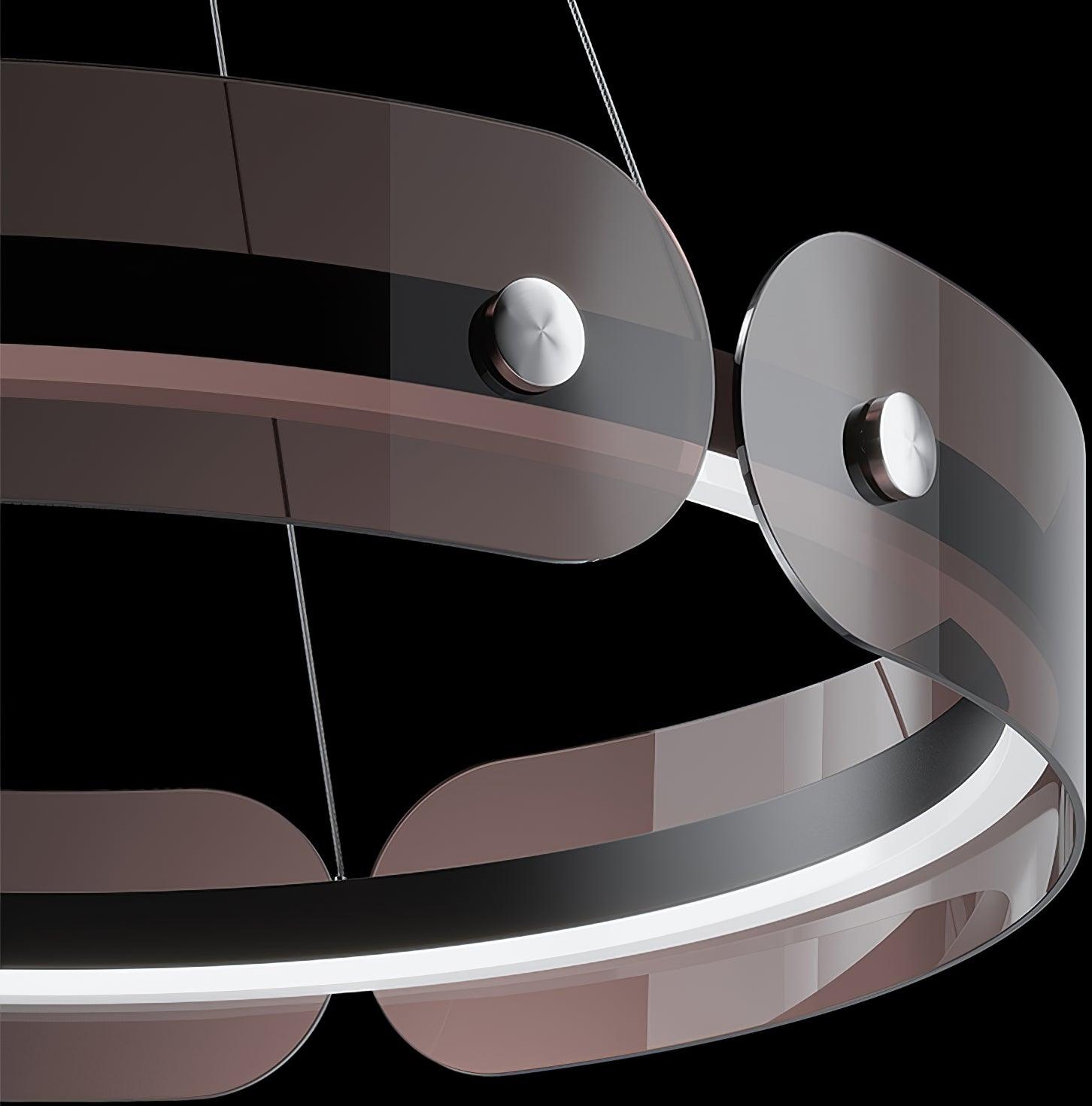 Dark-background detail of Javor’s rounded acrylic panel ends, silver fasteners and continuous white LED edge