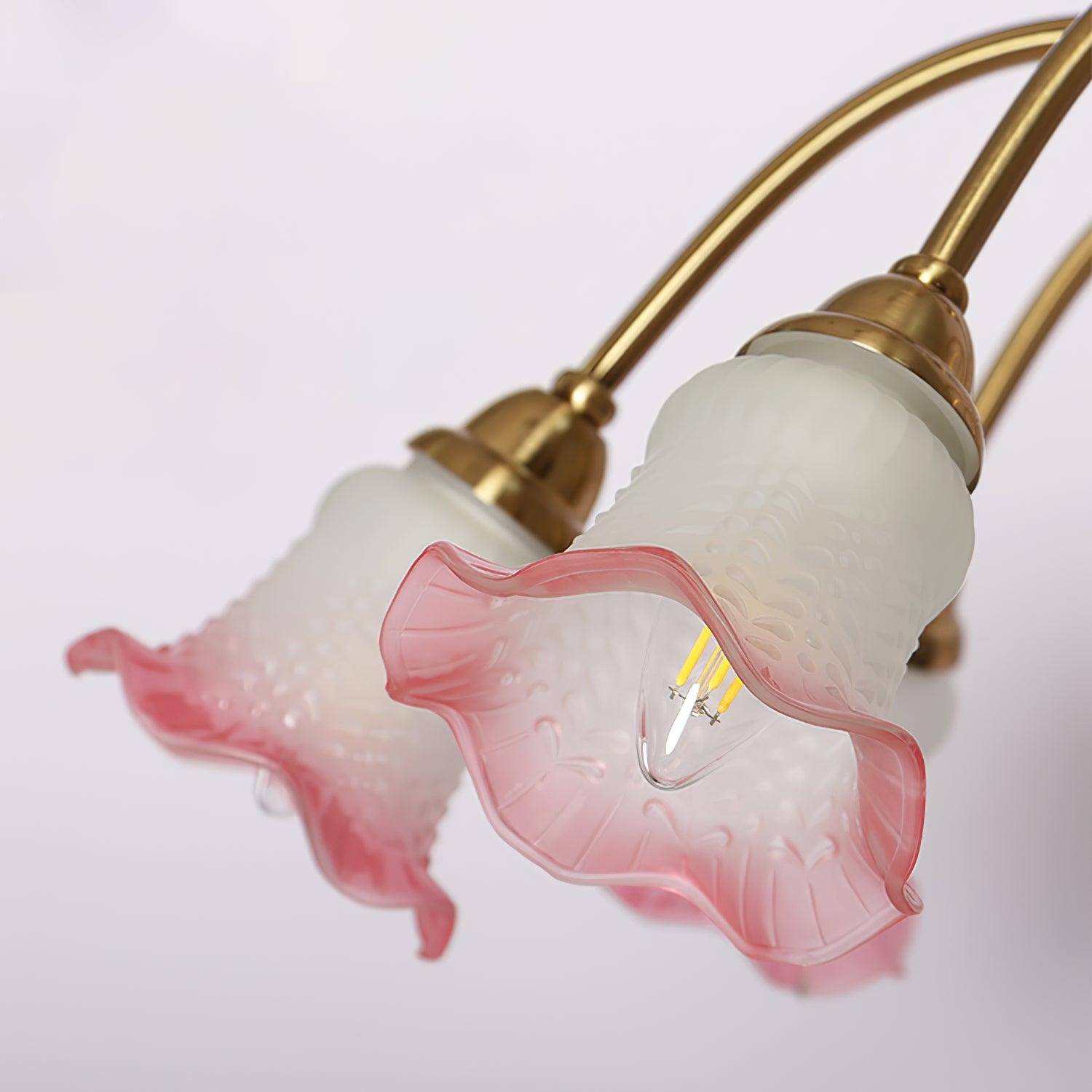 Close view of Pink scalloped glass trumpet shades