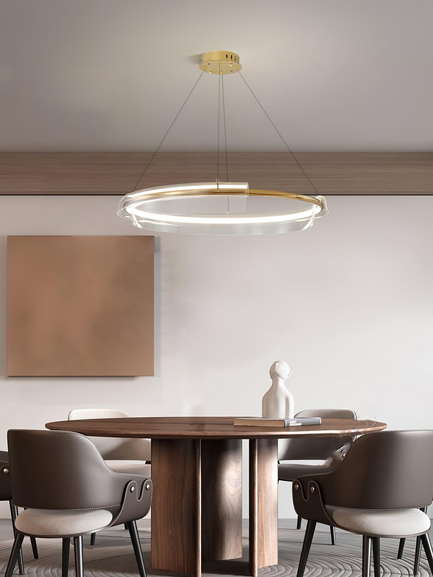 Ring chandelier above a round dining table
