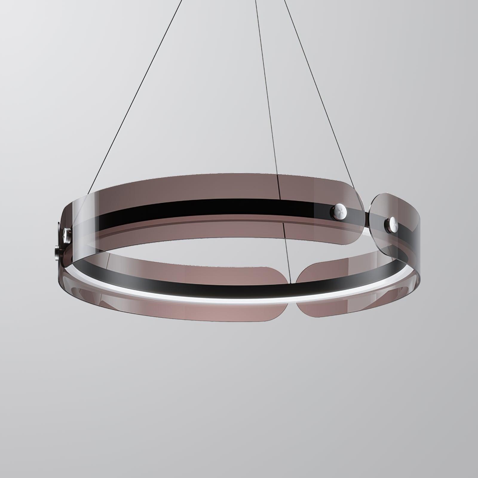 Close front view of Javor’s curved coffee-tinted panels, black ring, silver circular fasteners and white lower edge