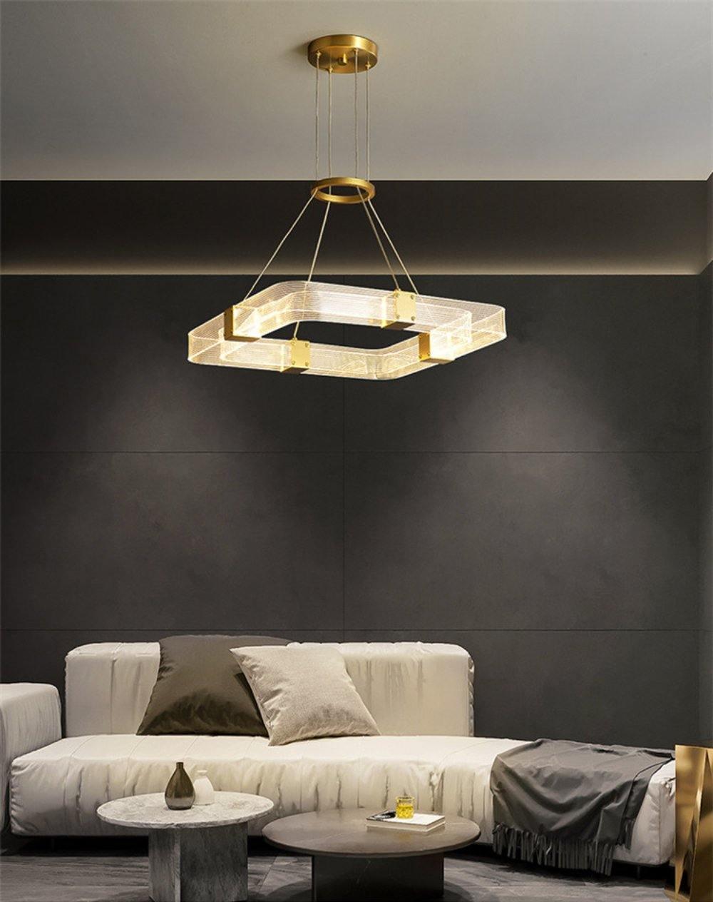 Parallel LED chandelier with textured acrylic bands and gold-tone connectors