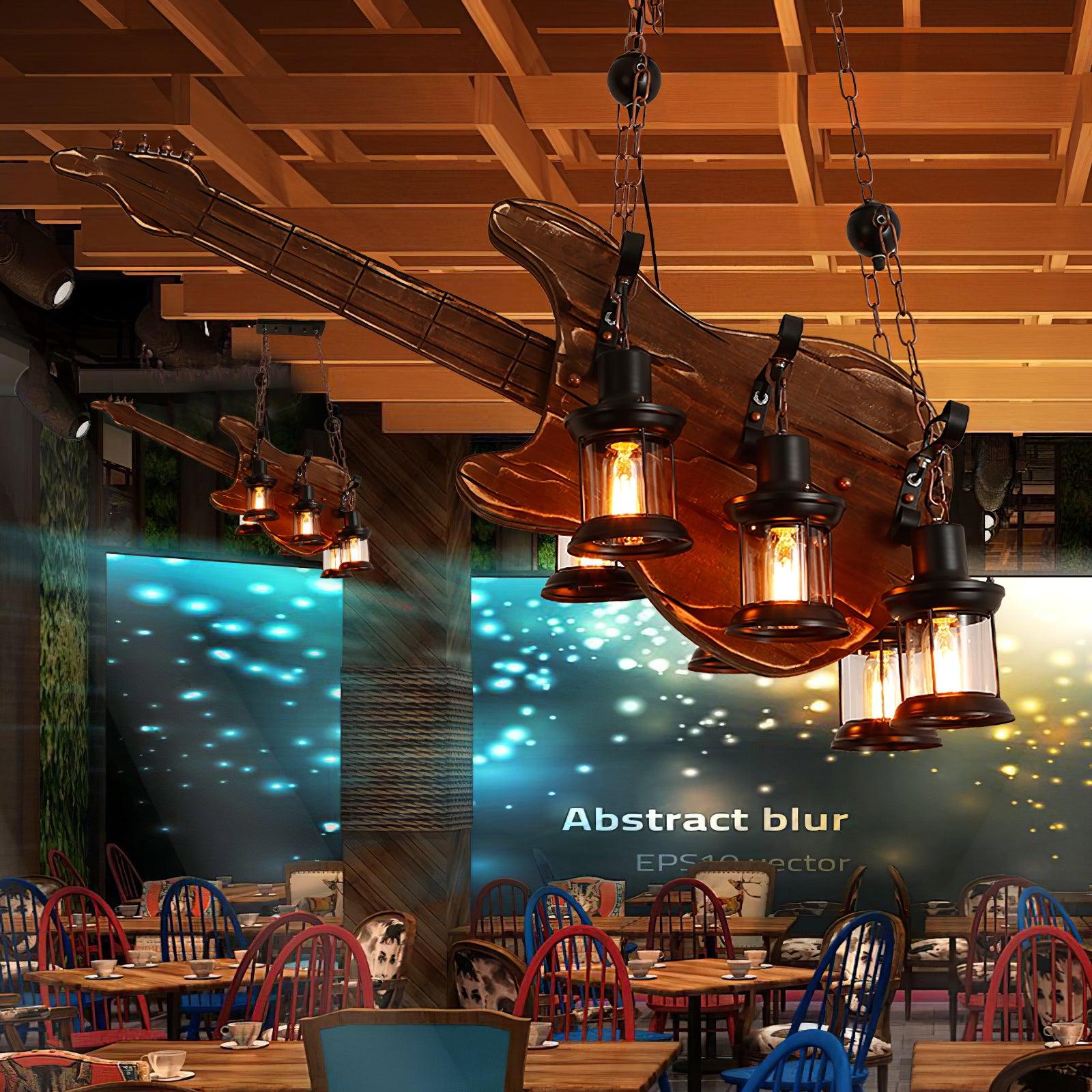 Guitar pendant above a restaurant interior