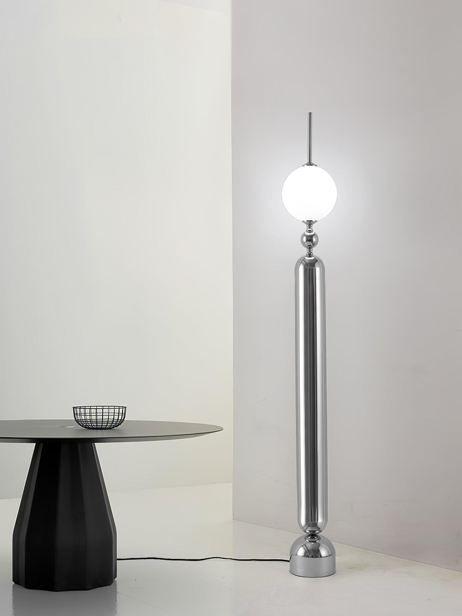 Lightning Rod chrome floor lamp with a white globe and vertical light strip