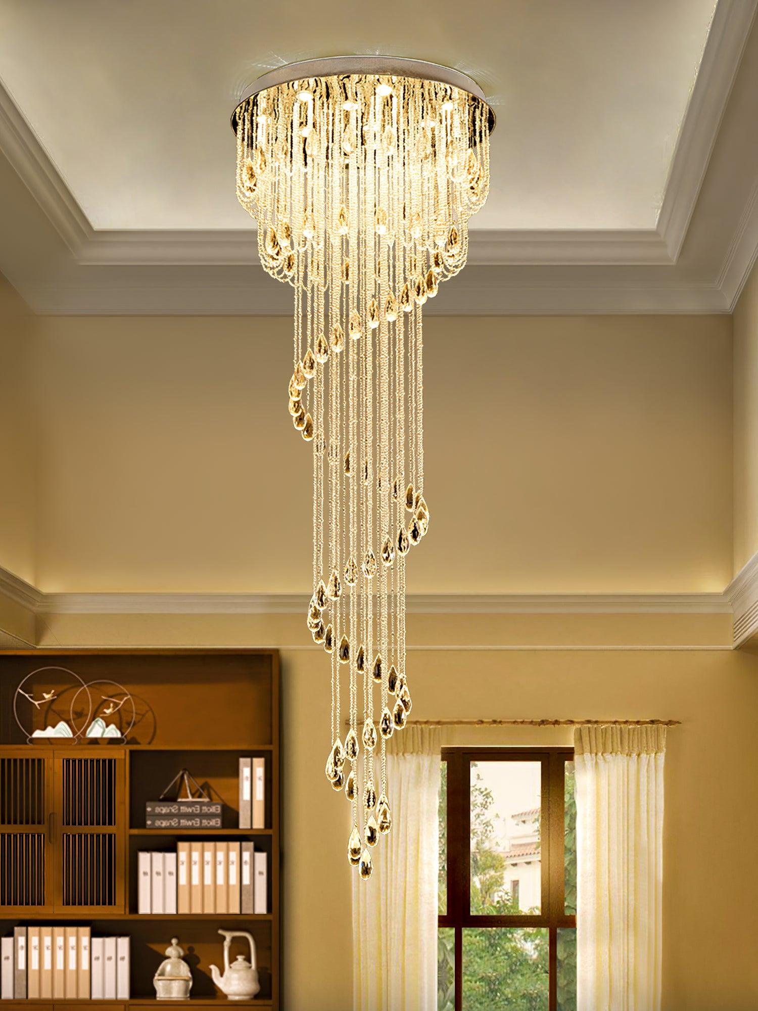 Lit crystal spiral in a cream room beside dark wood shelving with binders and white ceramics, near a curtained window