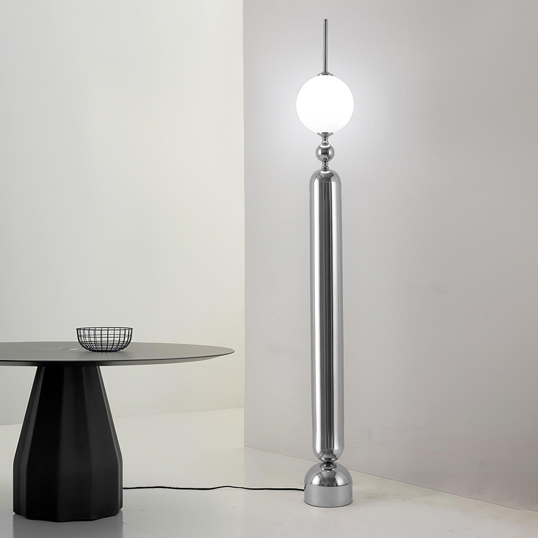 Lightning Rod chrome floor lamp with a white globe and vertical light strip