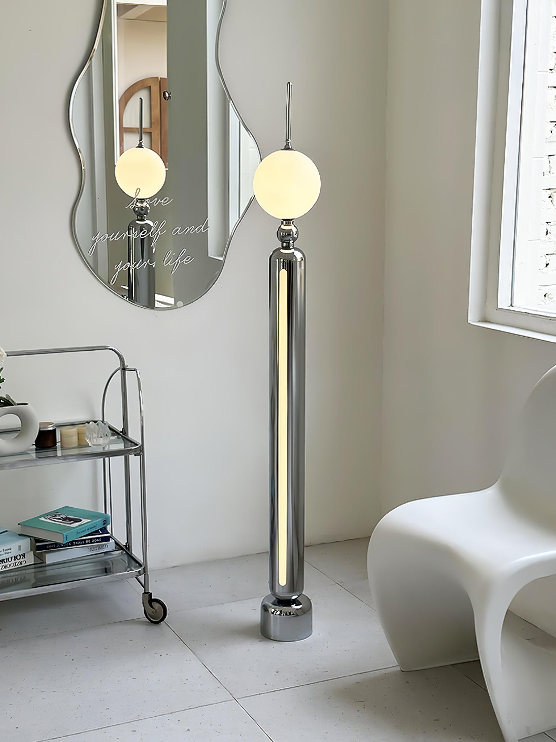 Lightning Rod chrome floor lamp with a white globe and vertical light strip