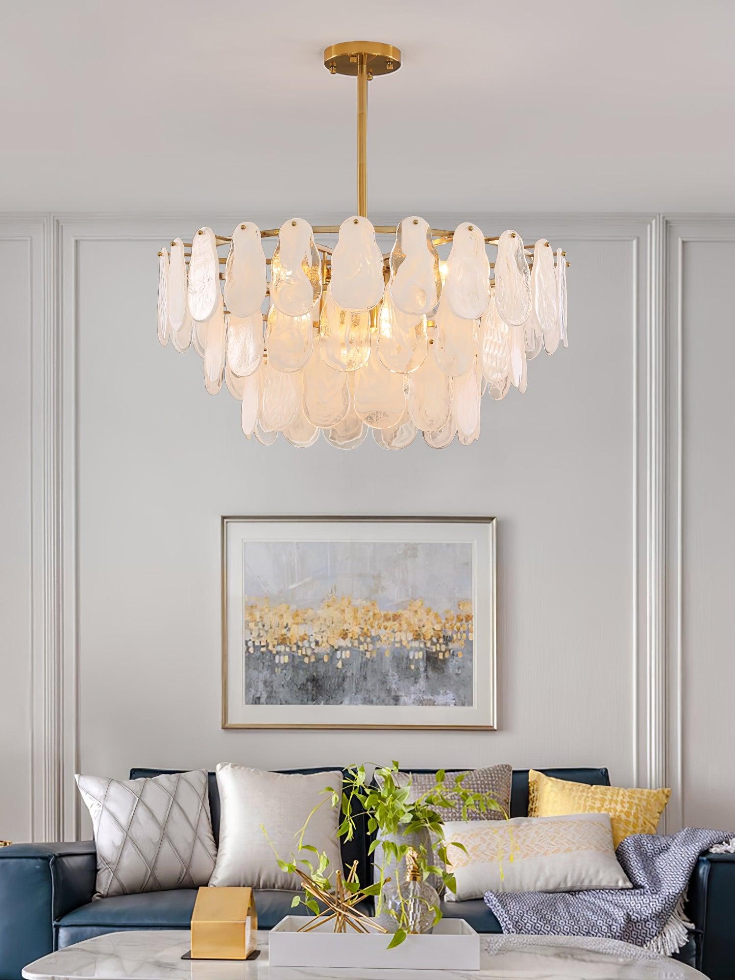 Round Cloud pendant in a grey living room above a sofa with yellow cushions