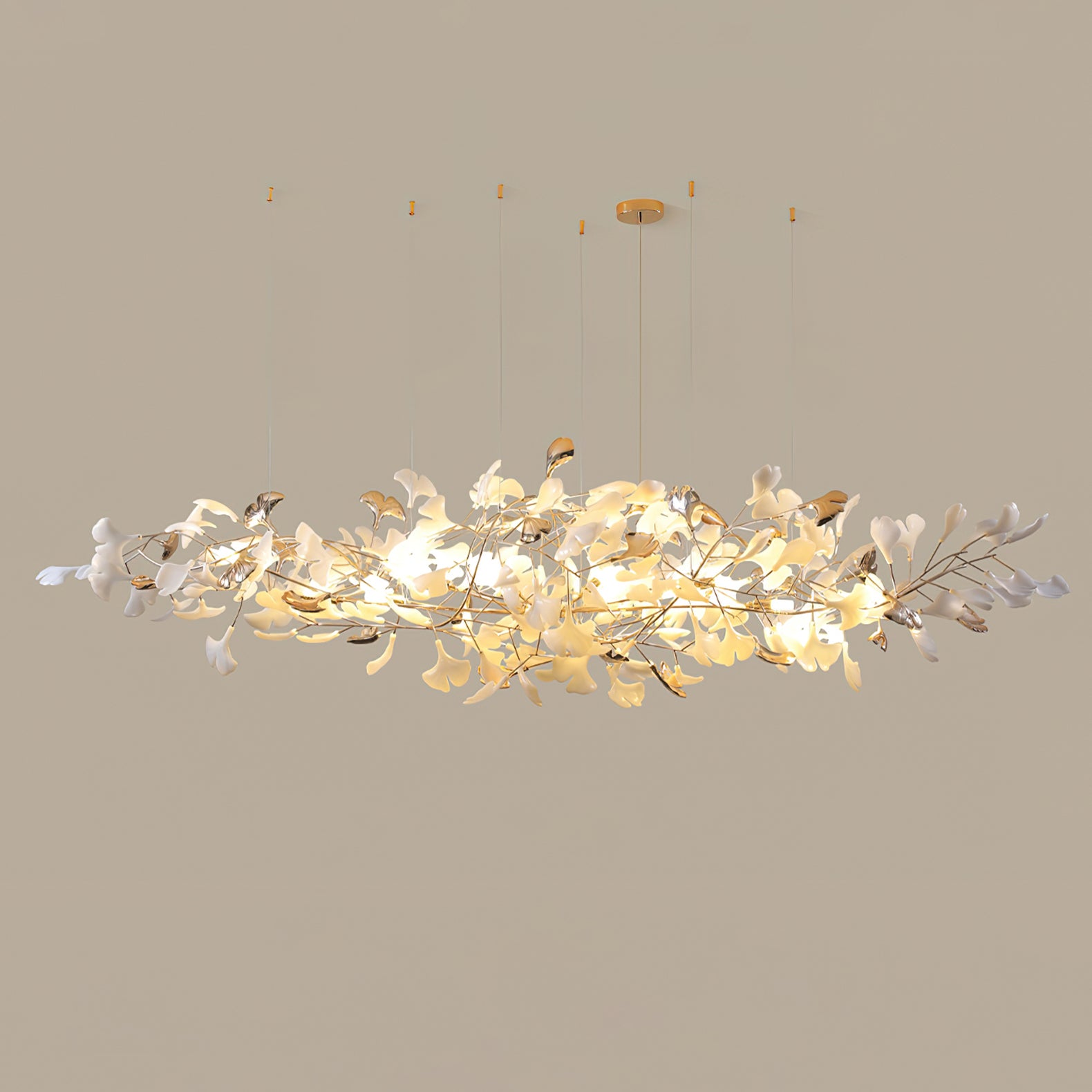 Model A horizontal white-and-gold leaf cloud on beige background, with branching stems and multiple suspension lines