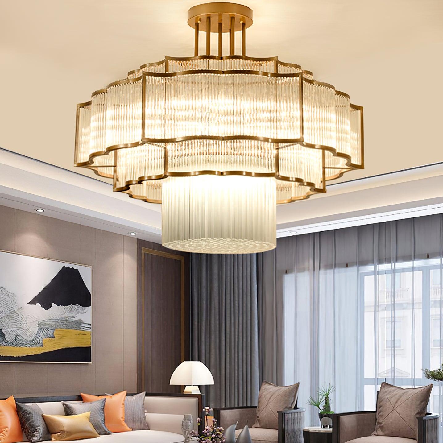 Pharo II tiered chandelier with clear ridged elements and a scalloped metal frame