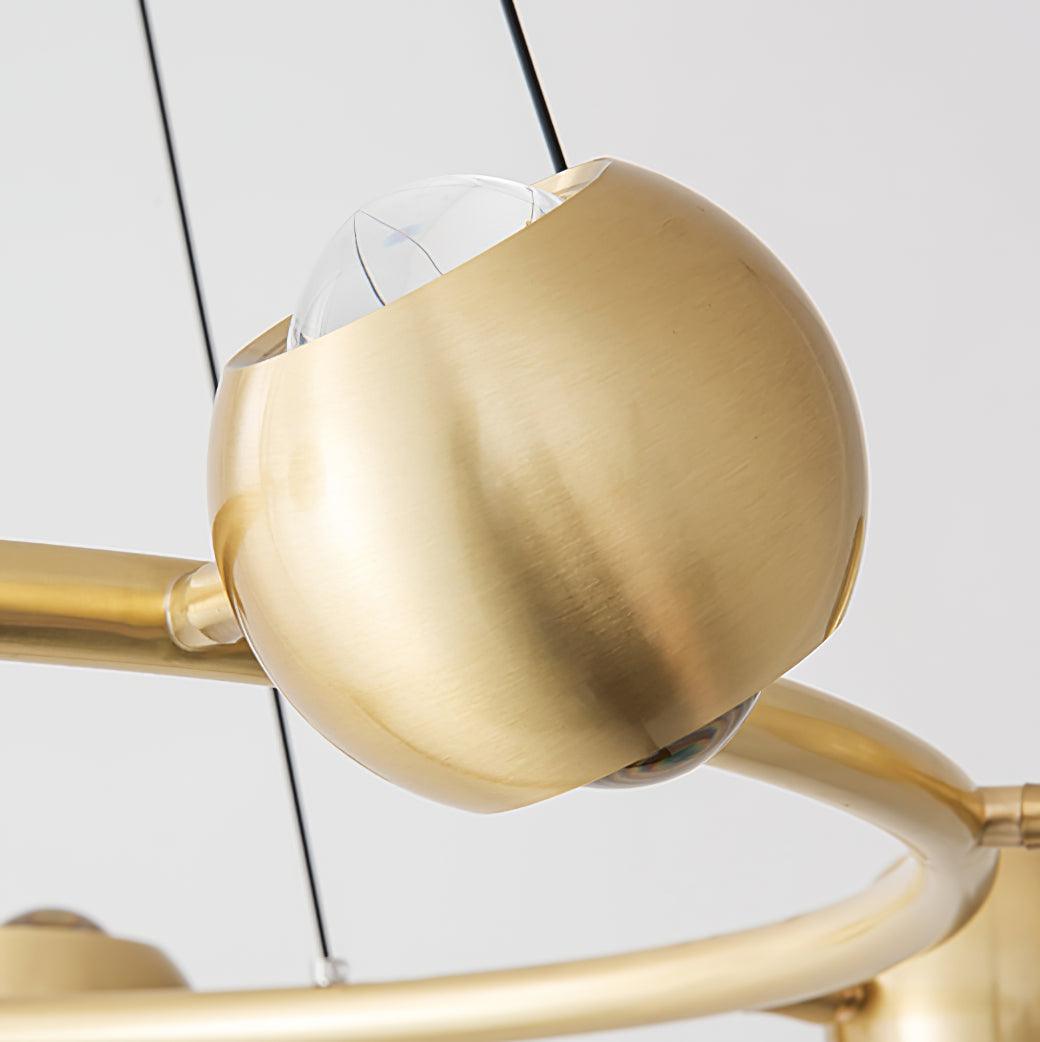 Brass spherical head with a lens on its upper face