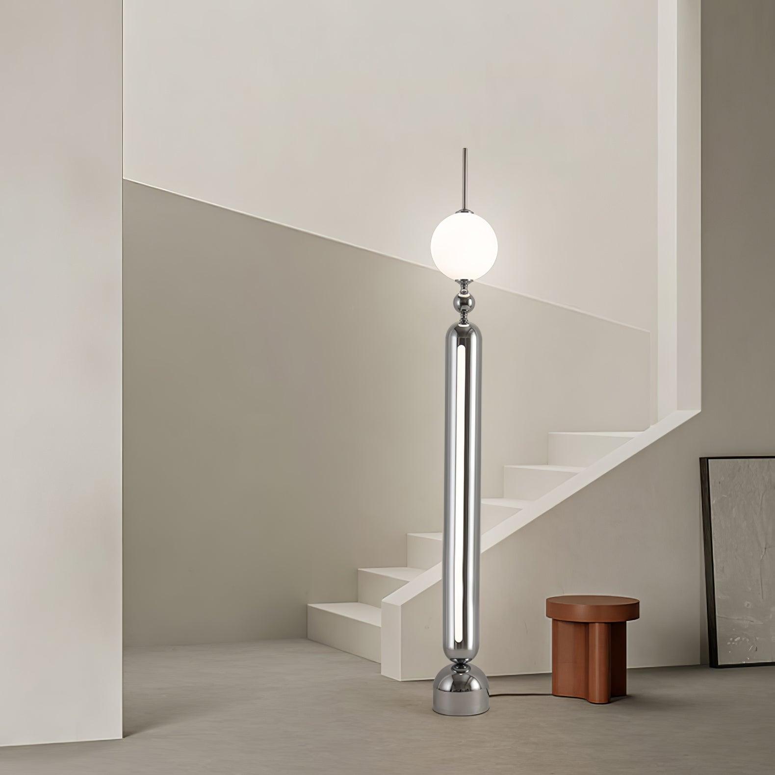Lightning Rod chrome floor lamp with a white globe and vertical light strip
