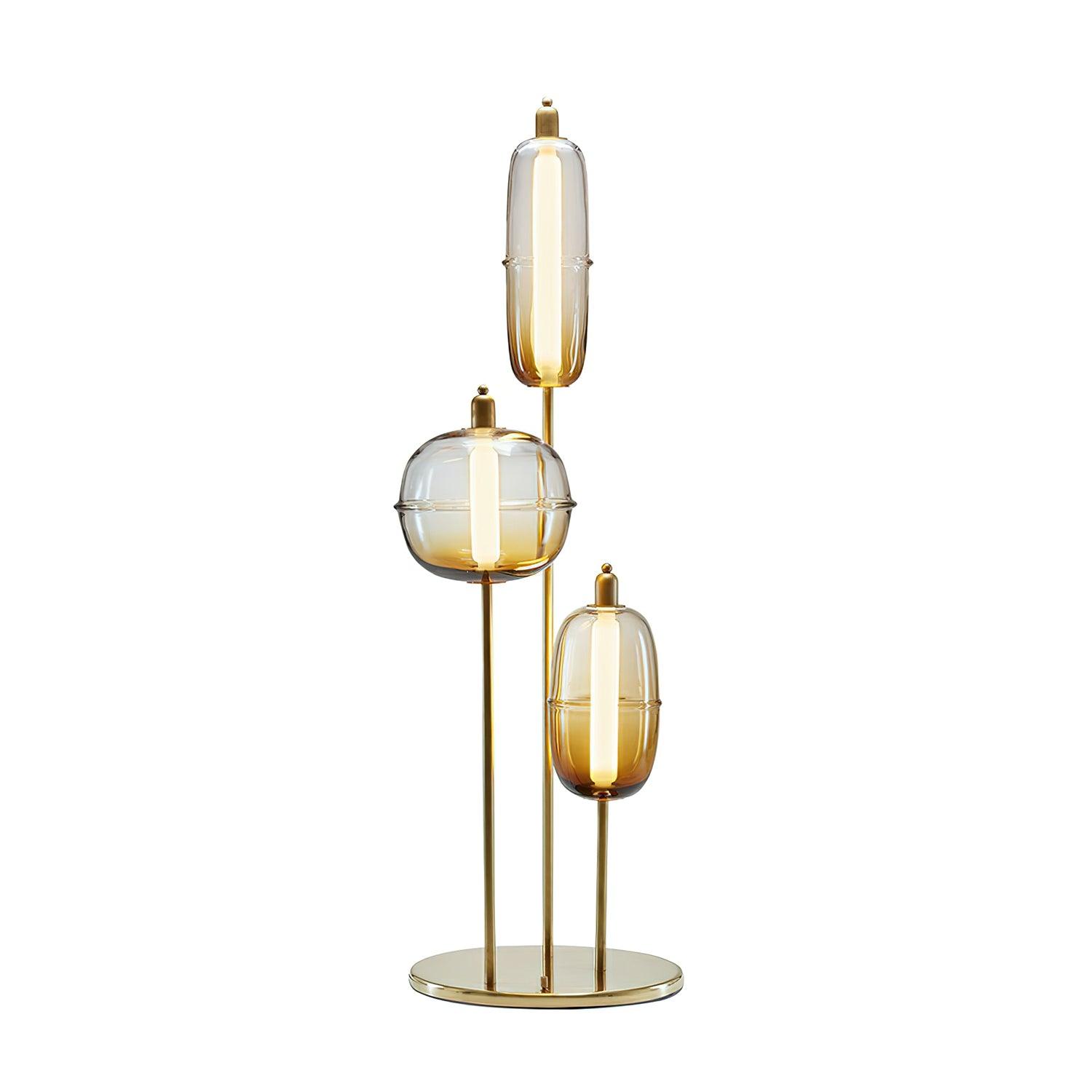 Amber glass option with two elongated shades and one rounded shade on staggered gold stems above a circular base