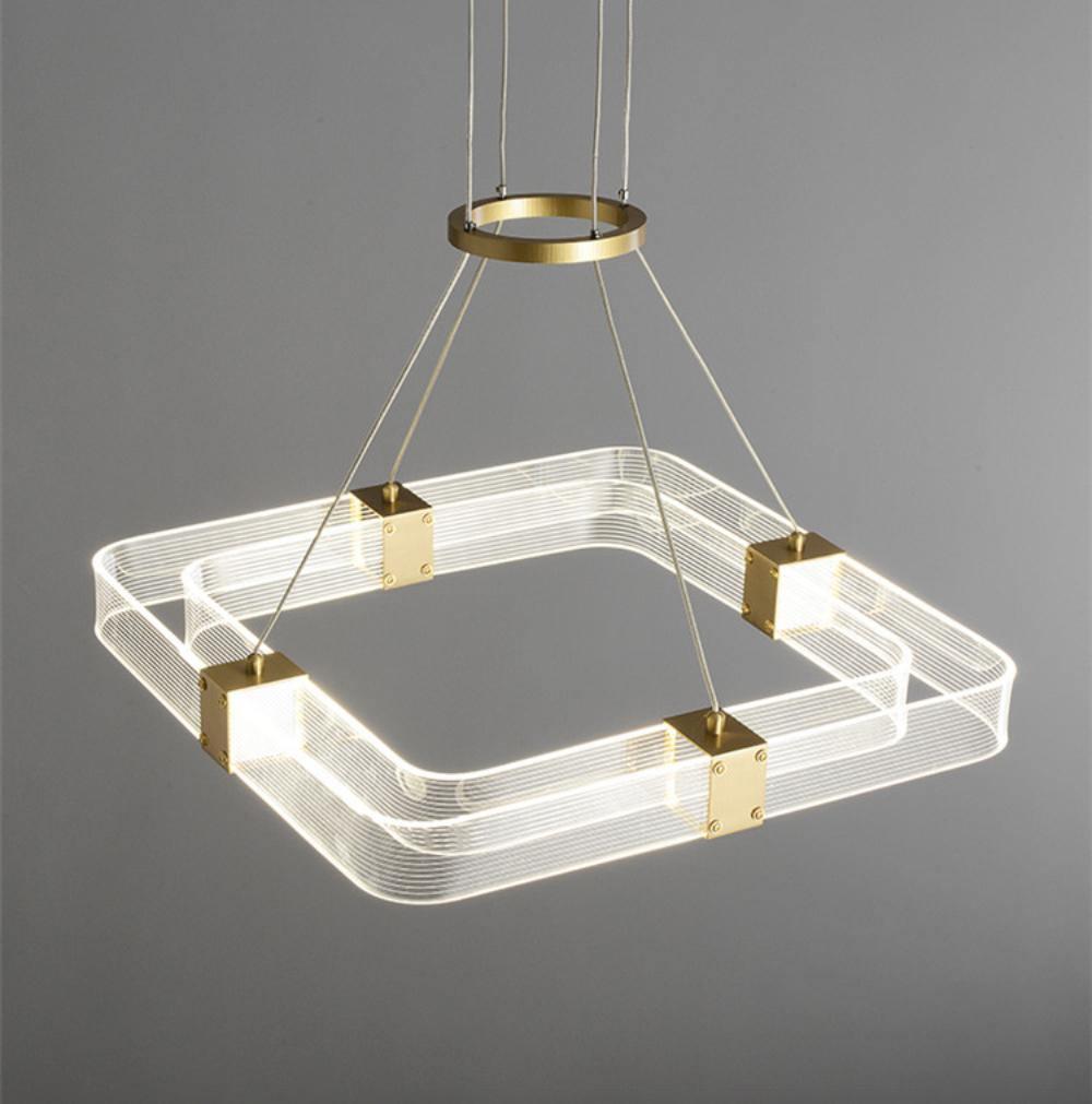 Parallel LED chandelier with textured acrylic bands and gold-tone connectors