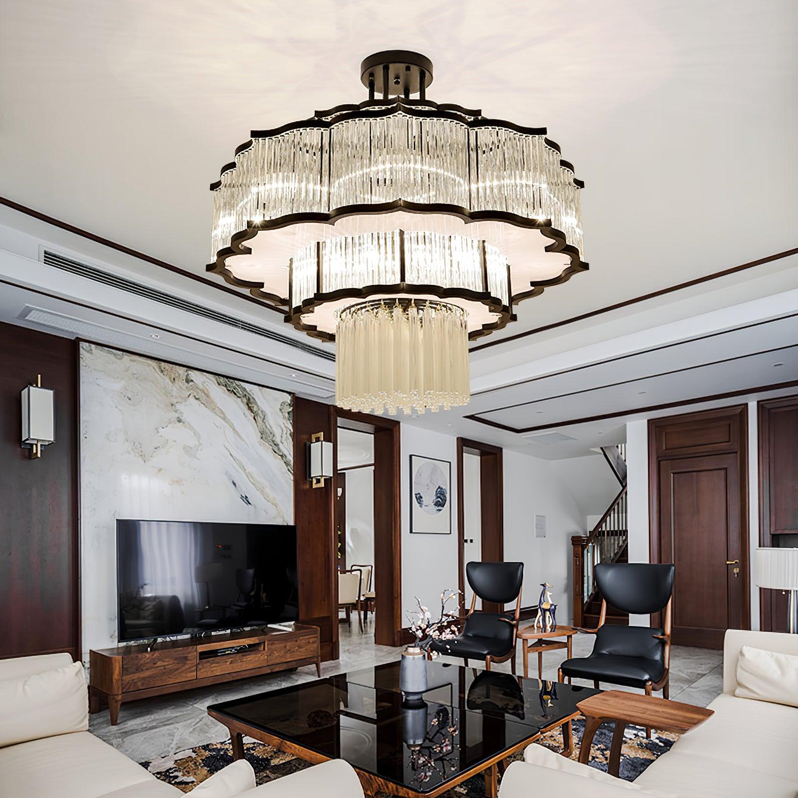 Pharo II tiered chandelier with clear ridged elements and a scalloped metal frame