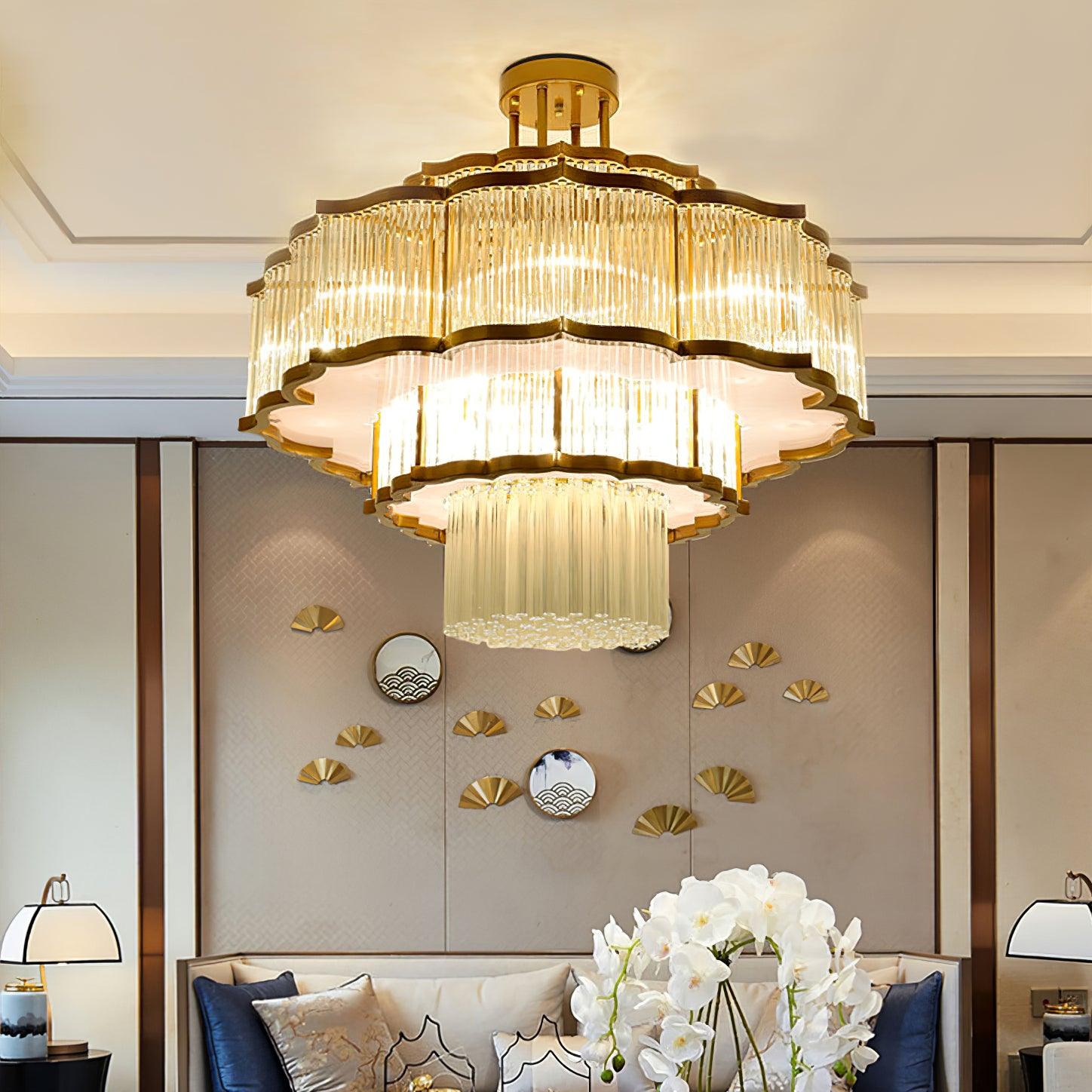 Pharo II tiered chandelier with clear ridged elements and a scalloped metal frame