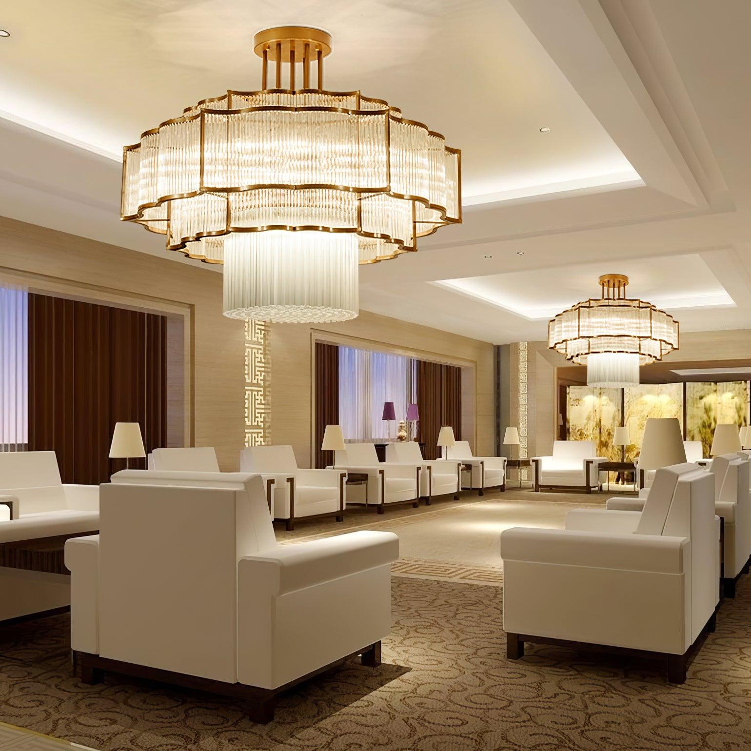 Pharo II tiered chandelier with clear ridged elements and a scalloped metal frame