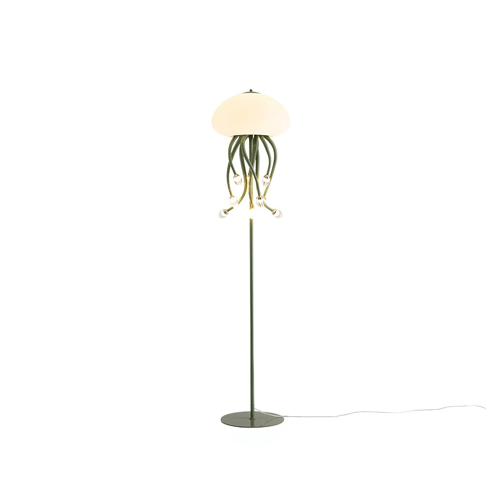 Green nine-arm floor lamp isolated on white, showing lit dome, hanging droplet lights, round base and extended cord.