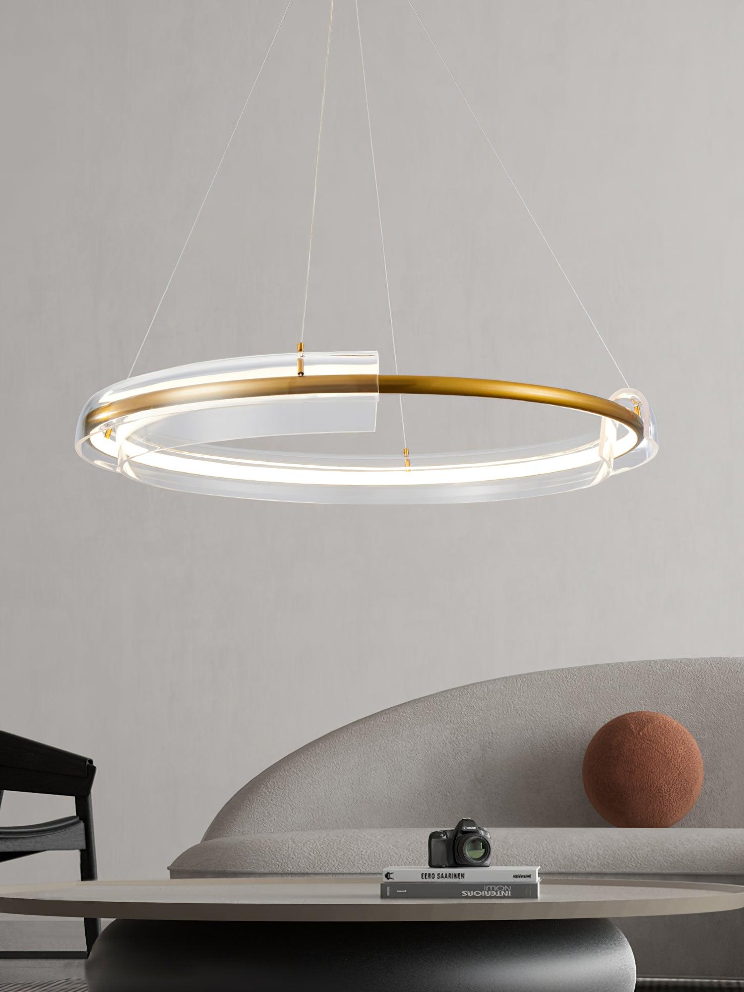 Circular chandelier above a living-room table